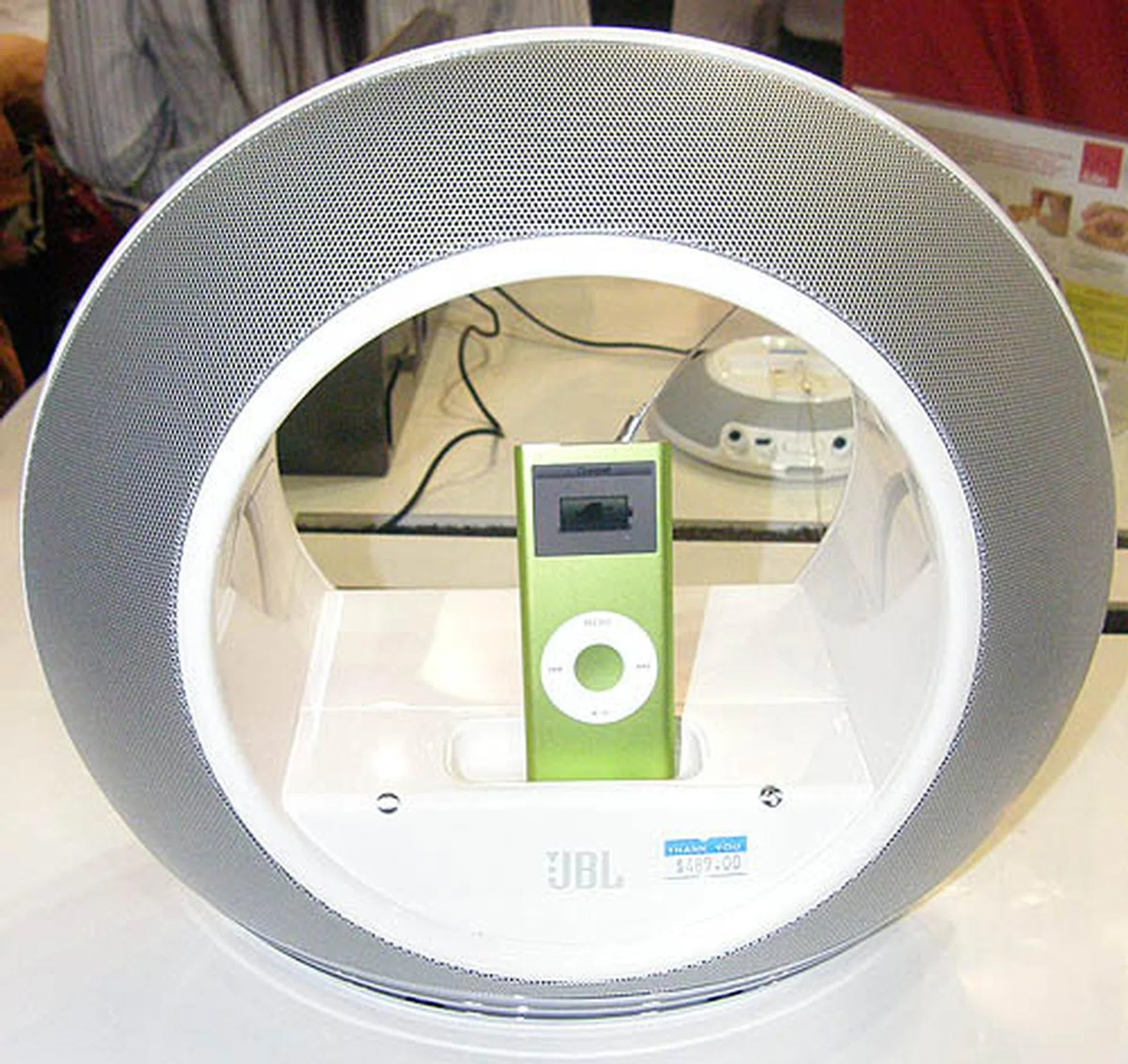  A flourishing industry has sprung up creating accessories and other Apple related products. This radial speaker from JBL is but one of many such iPod speaker docks available at the Apple booth.  