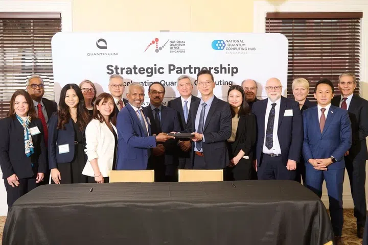 Representatives from Quantinuum and Singapore at the signing ceremony of the Strategic Partnership Agreement in New York