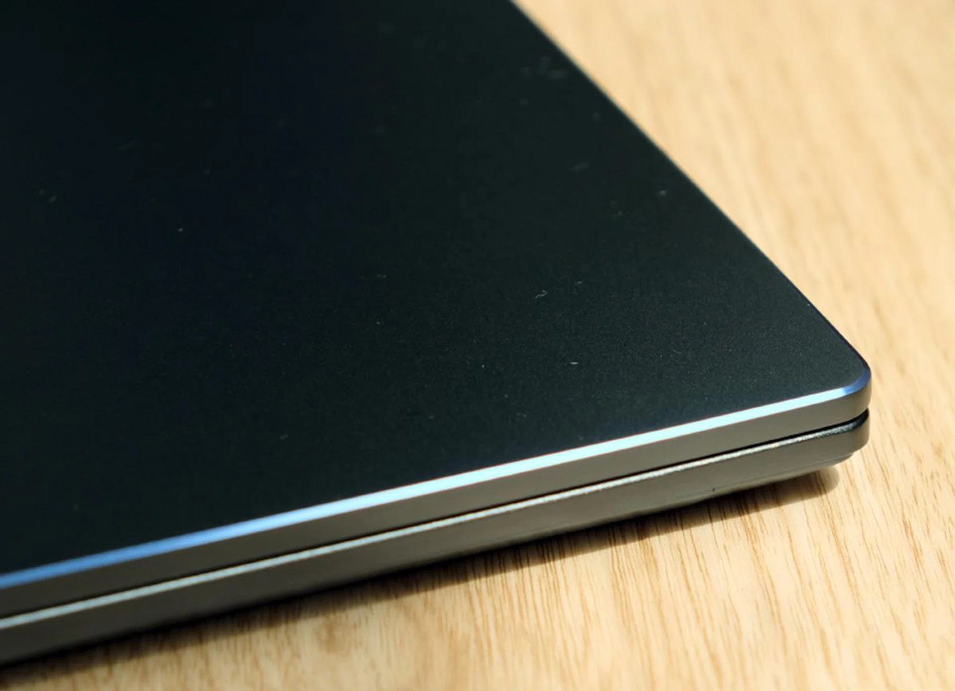 Beveled edges and just 15.9mm thick.