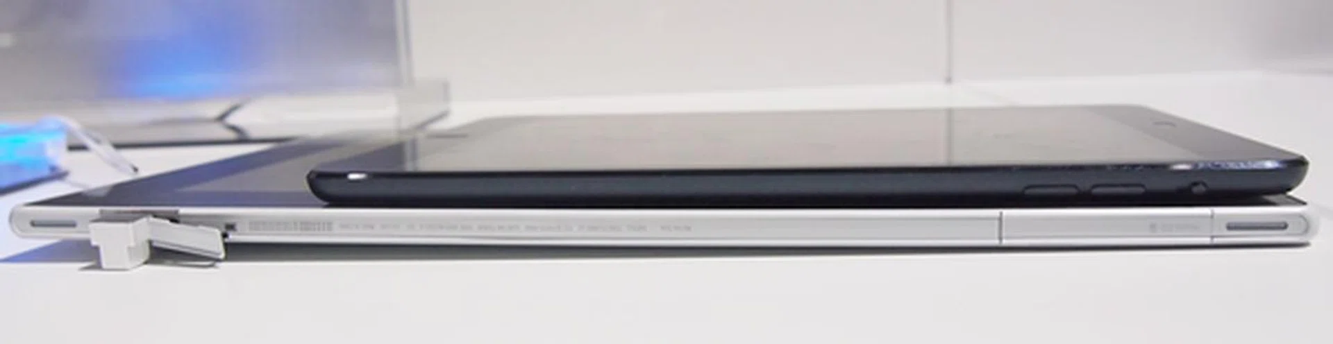 The 10.1-inch Sony Xperia Tablet Z (bottom) claims the title of slimmest tablet from the 7.9-inch Apple iPad mini (top).