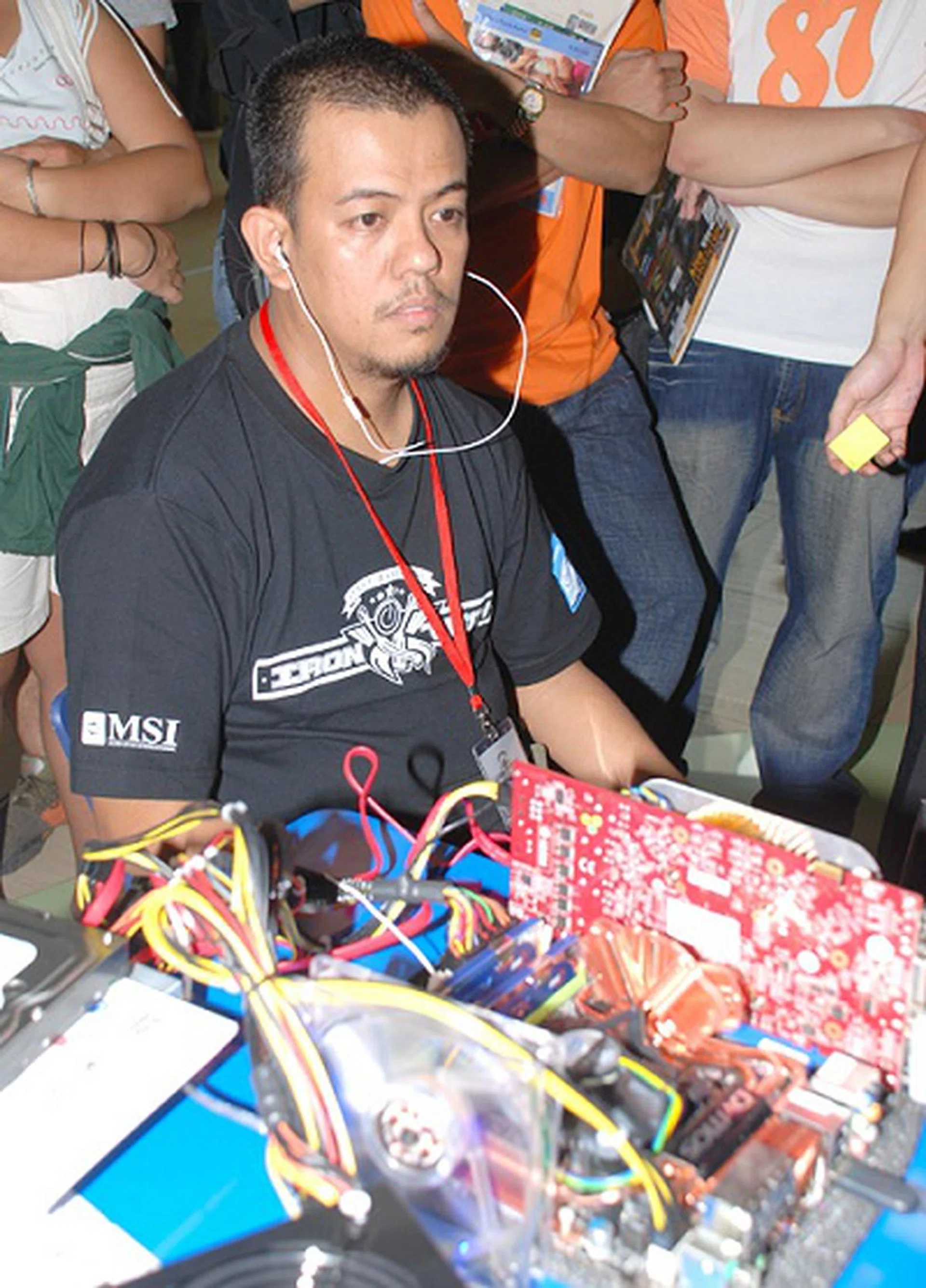  Ronaldo Bejarin tuned in to his own tunes while busy tweaking for the best outcome.  