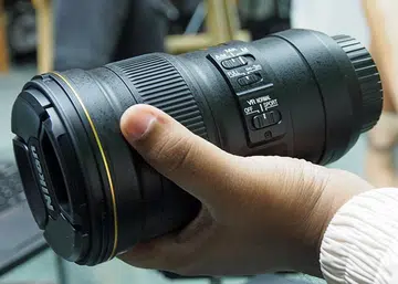 The new AF-S Nikkor 300mm f/4D IF ED  from Nikon is small and light enough to hold comfortably in one hand.
