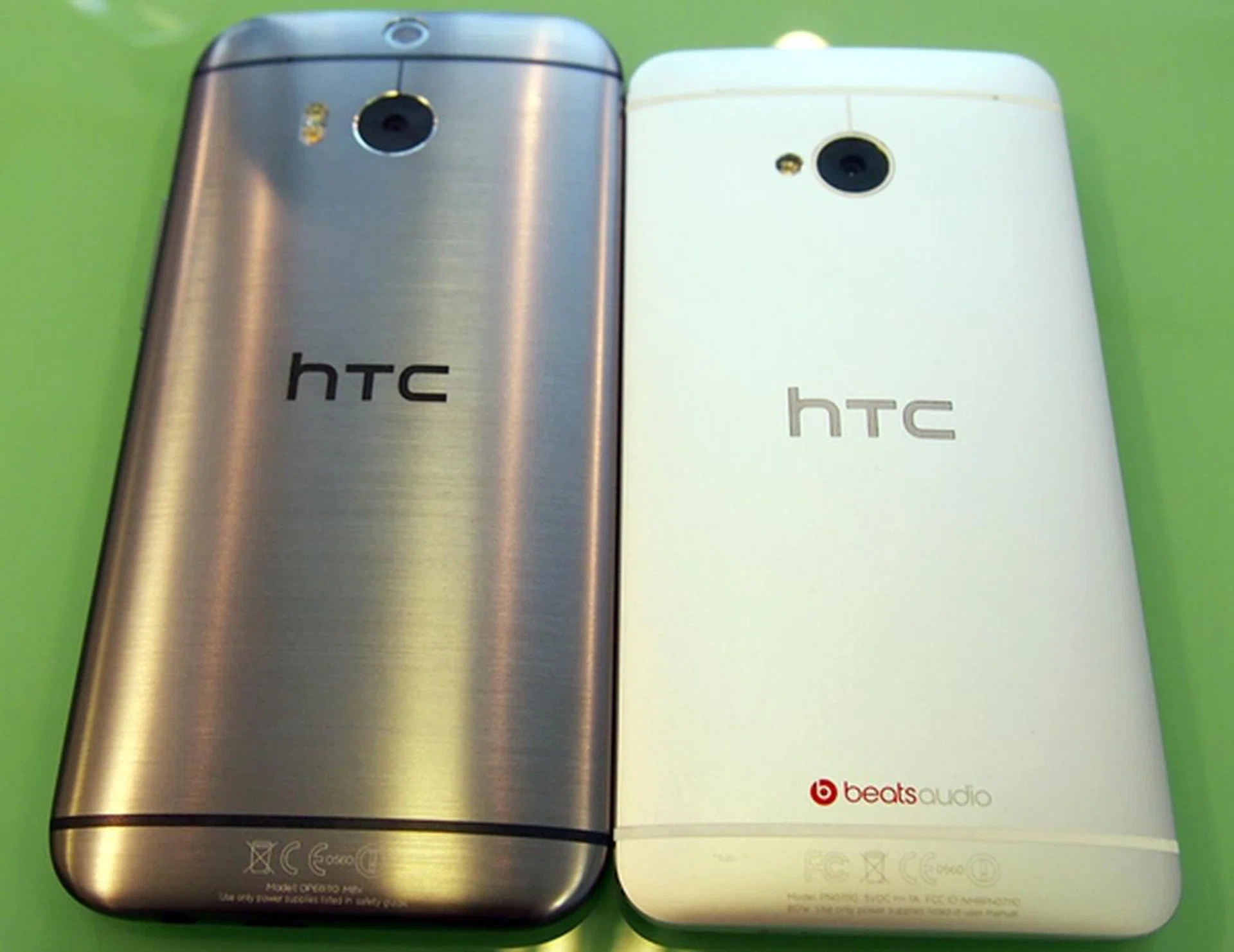 The Gunmetal Grey HTC One (M8) has a different finish and texture compared to the original HTC One (right).