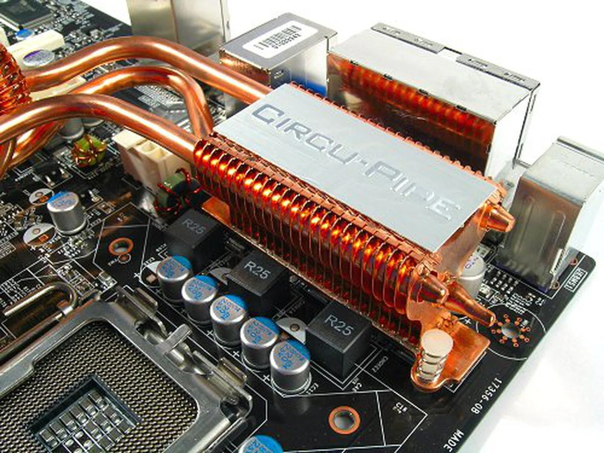 The rear heatsink seems to be the main cooling block for the whole system, so it would have to depend on your CPU cooler to provide it sufficient exhaust air flow.