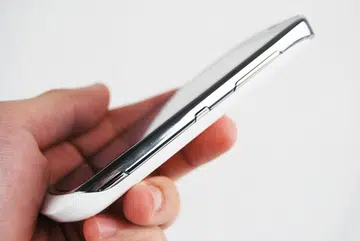 Three buttons (from bottom up: camera shutter, power control and volume controls) are situated on the right side of the Nokia Lumia 610. While they are slightly raised, we feel that the power button (center) could be made larger for easier use.