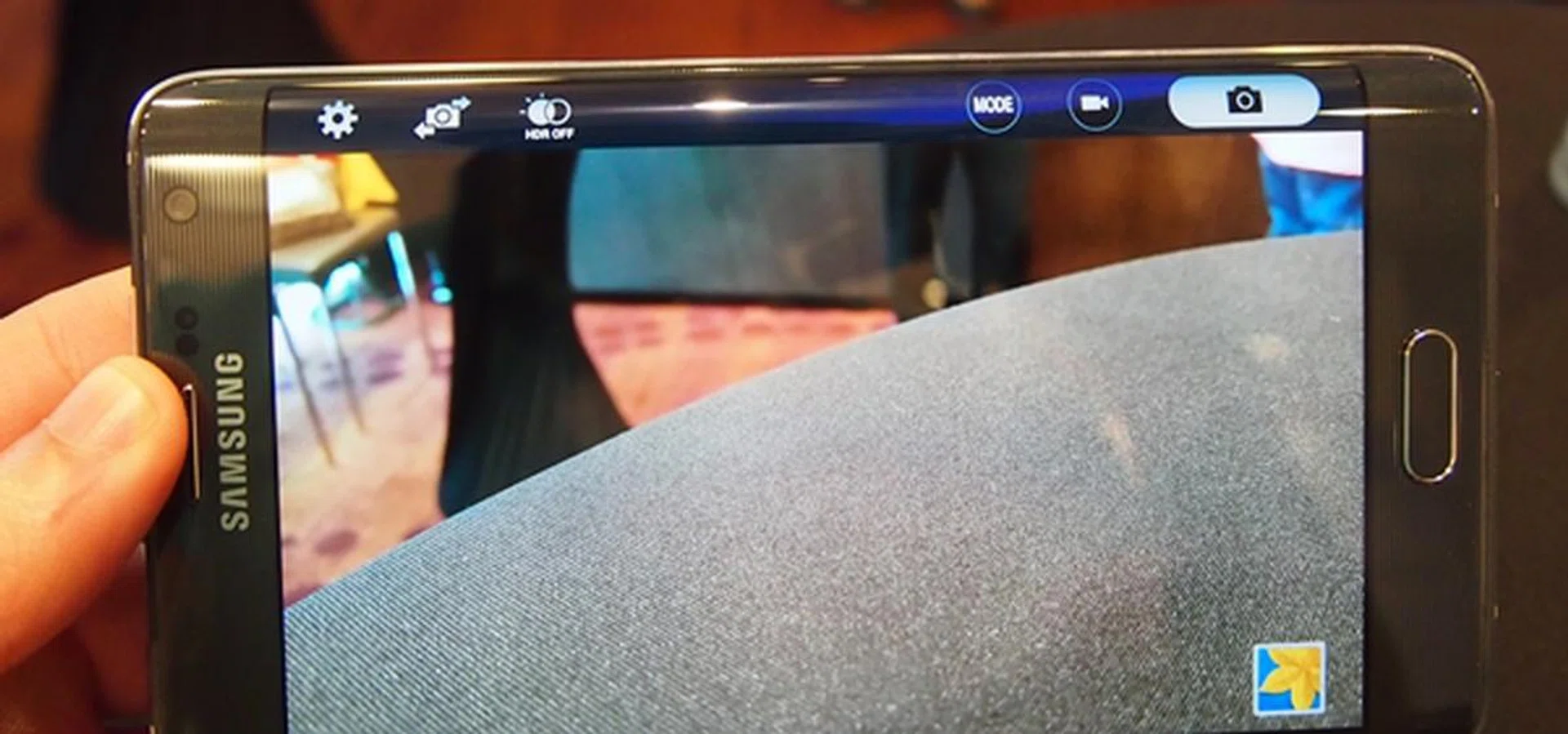 Camera modes and settings are situated on the curved edge so that they will not clutter the viewfinder on the Galaxy Note Edge.
