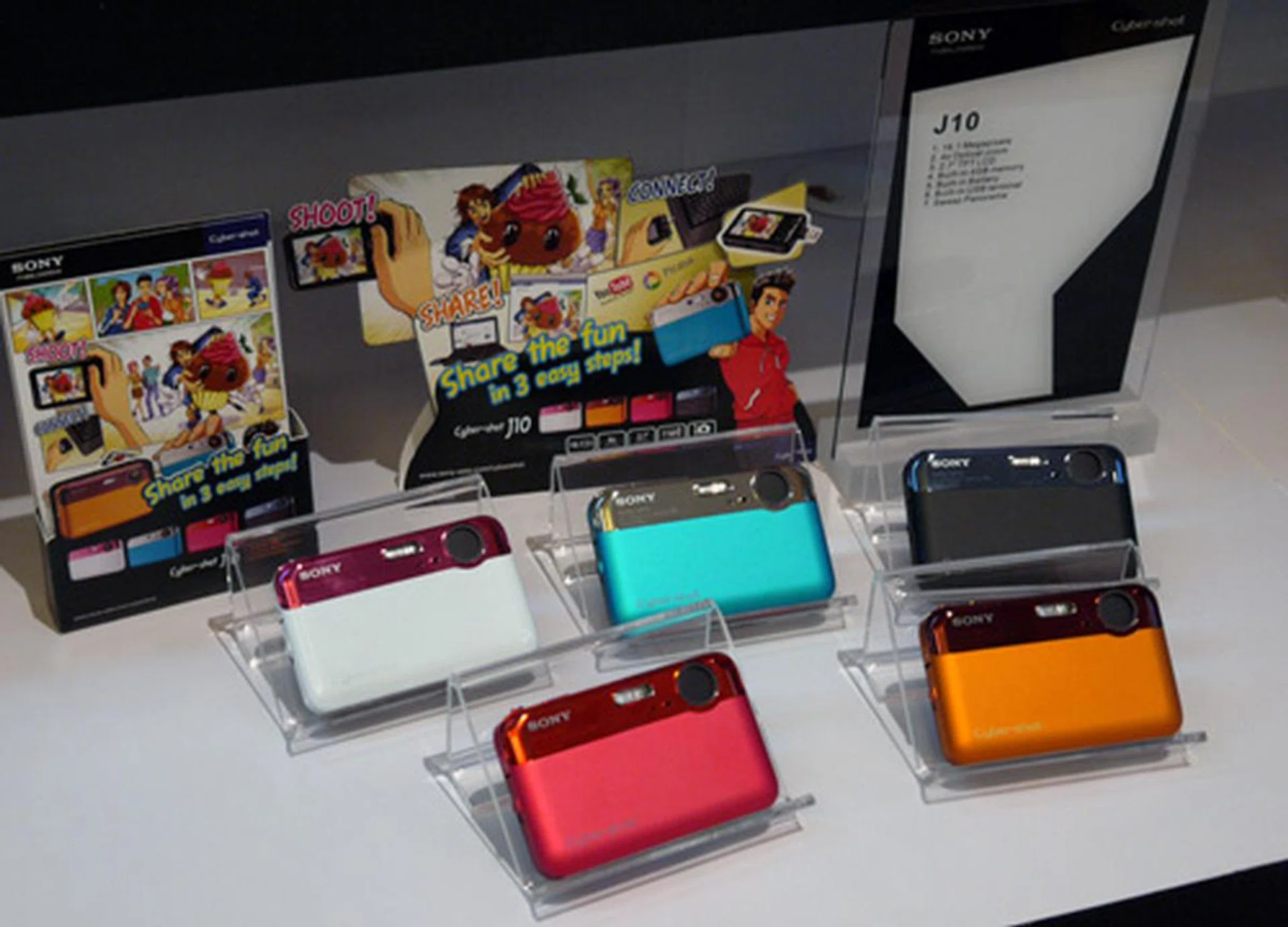 Another show stealer is the Cyber-shot J10. The cutesy point-and-shoot features a built-in USB connector (similar to what you might find on a CISCO Flip MinoHD) which eliminates the need for USB cables.