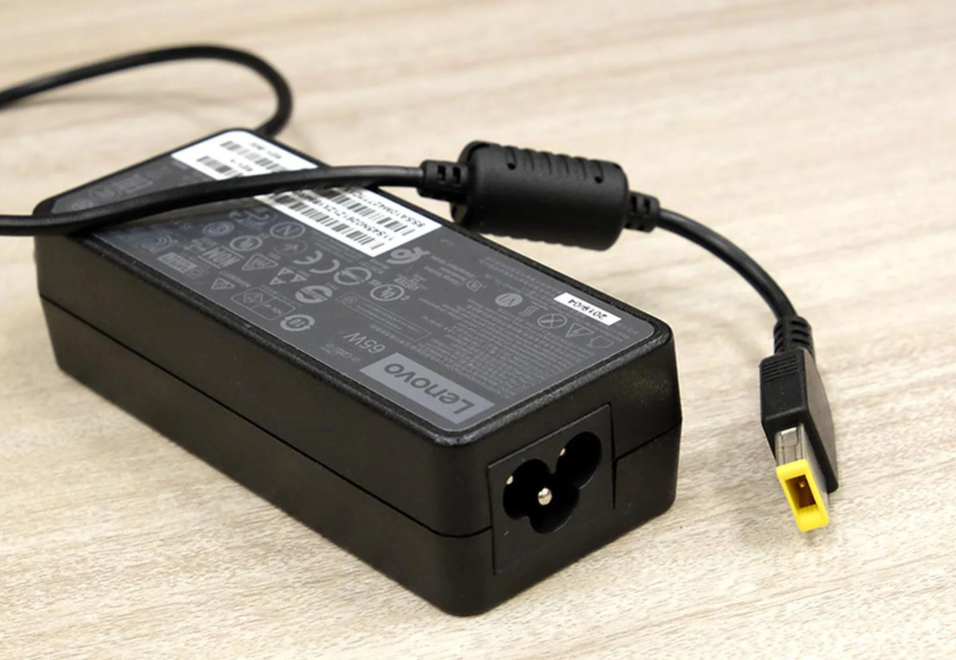The ThinkBook 13s relies on a slim tip connector charging. Fortunately, the power adapter is compact.