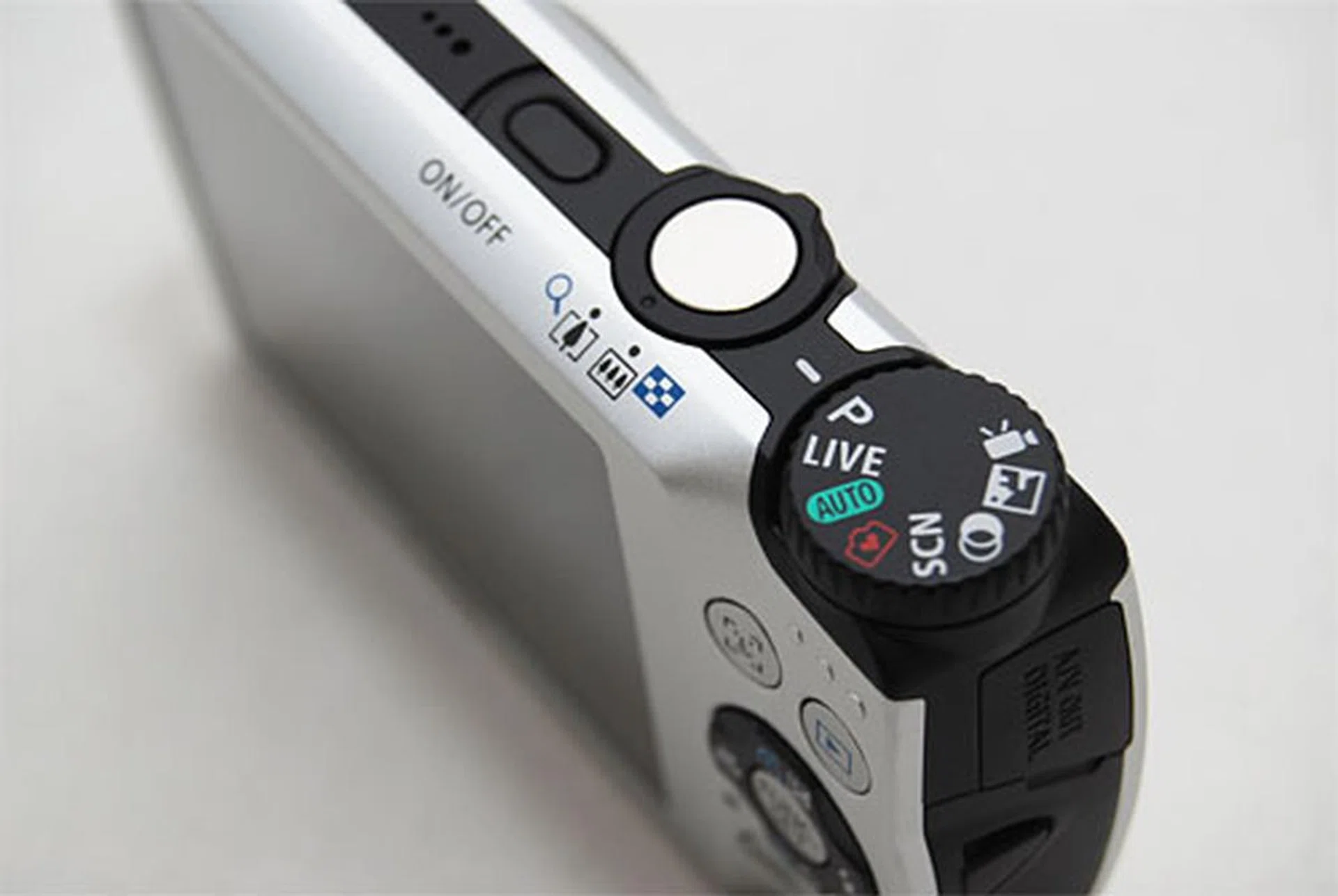 The Mode dial is exposed right to the edge, giving you more surface to touch.