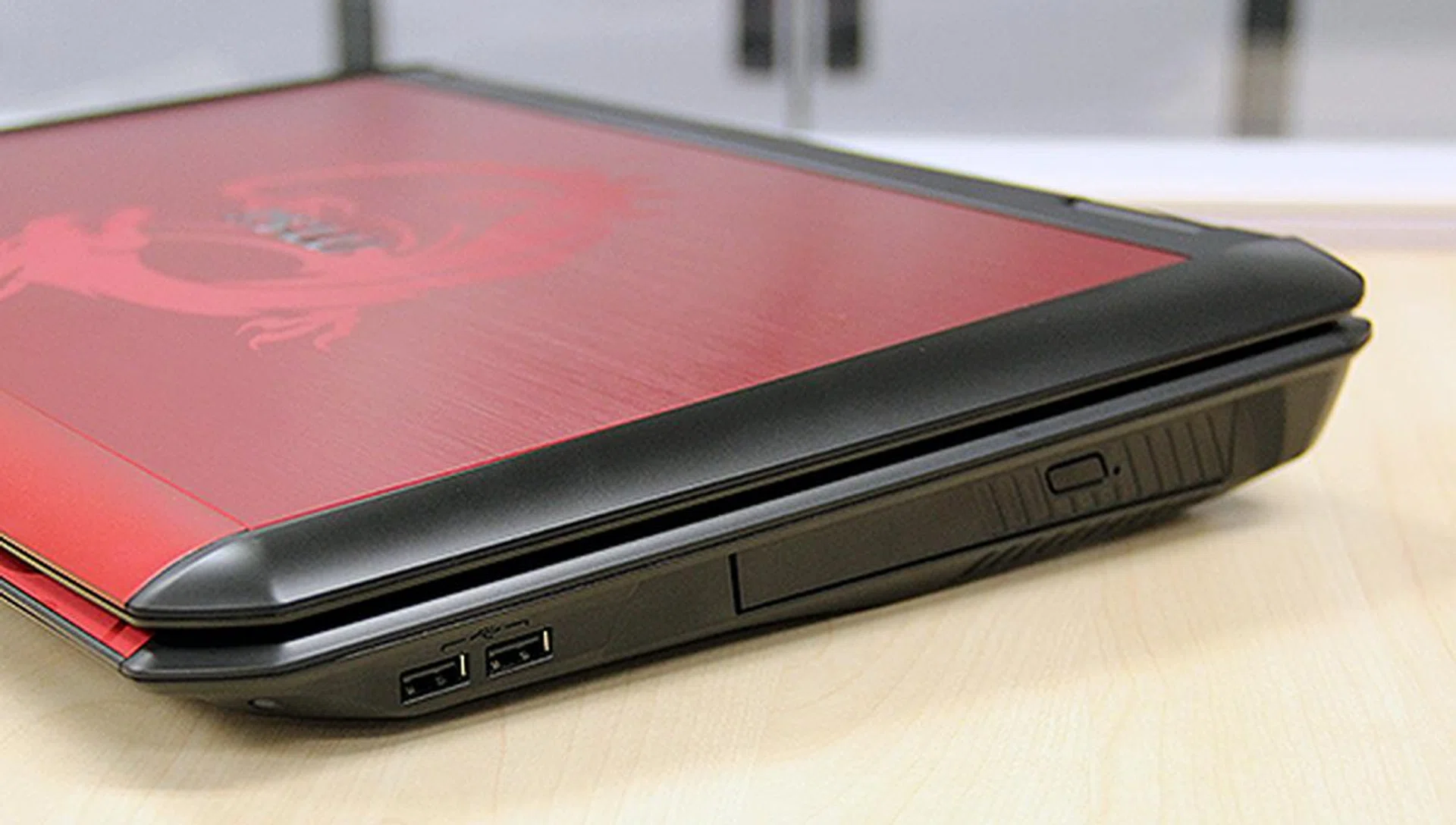On the right are two USB 2.0 ports and a Super Multi DVD drive.