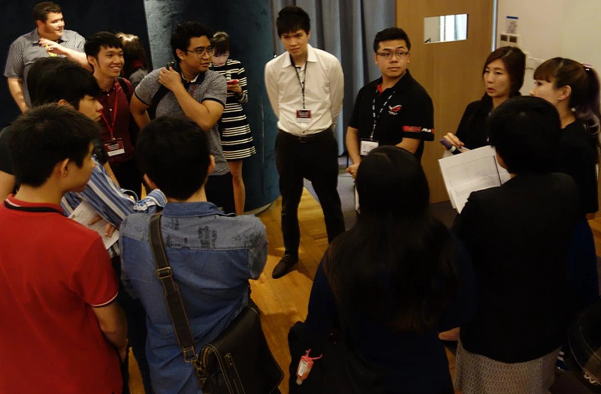 The inner circle of 10 lucky attendees who were being briefed on the details of the competition.