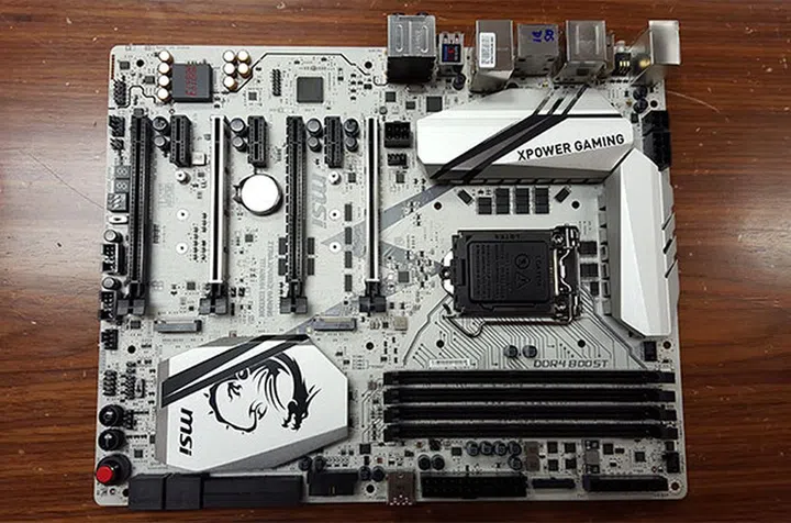 The entire PCB is colored a unique titanium-silver color. Do note the silver-colored first and third PCIe 3.0 slots, which have been reinforced with MSI's Steel Armor to hold up better under heavy GPUs.