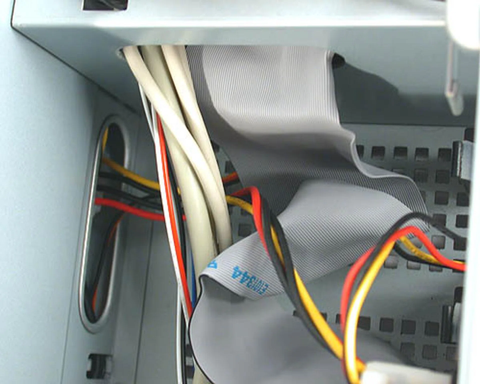 An example of the work that lies ahead. Routing the cables, especially IDE cables through the small apertures between the chambers can be quite daunting. 