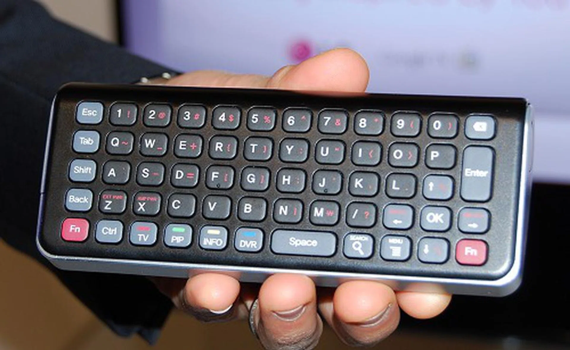 The flip side reveals the QWERTY keyboard, useful for internet browsing.