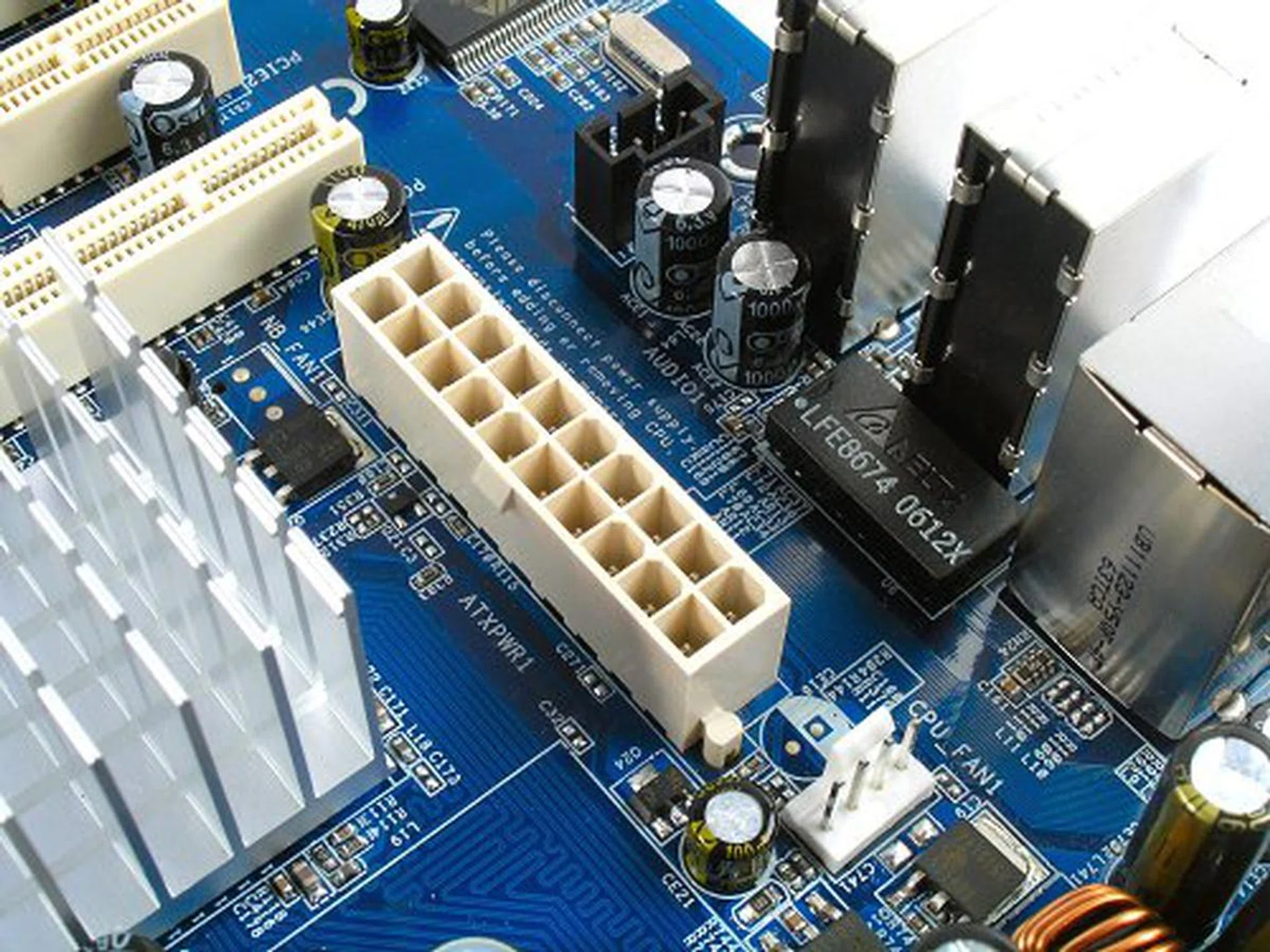 Main 24-pin ATX power connector at the rear of the board.