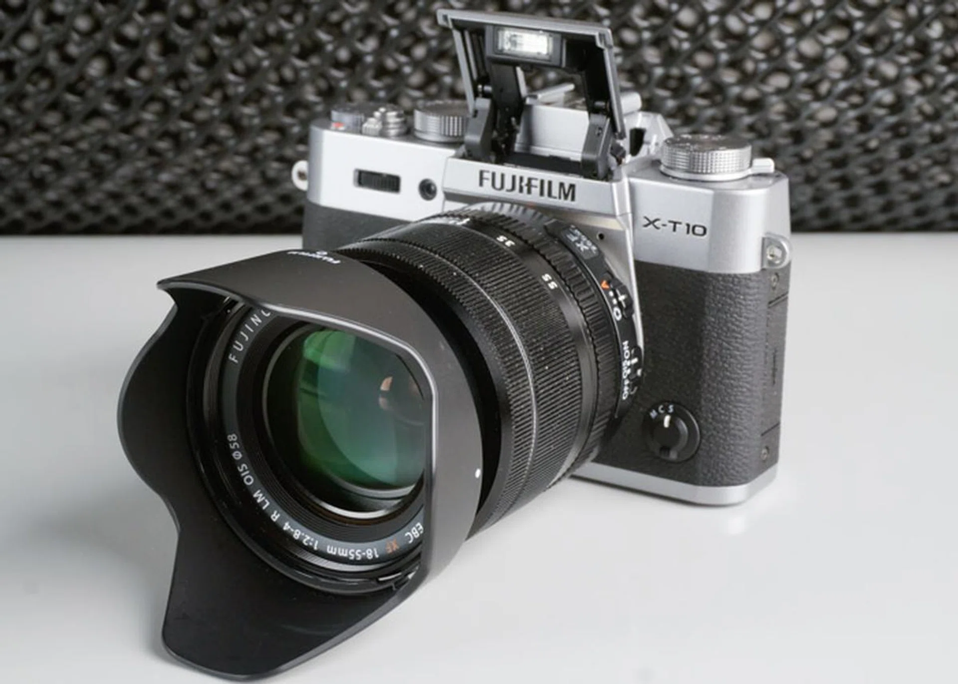 The X-T10's pop-up flash is one of the more obvious differences from the X-T1.