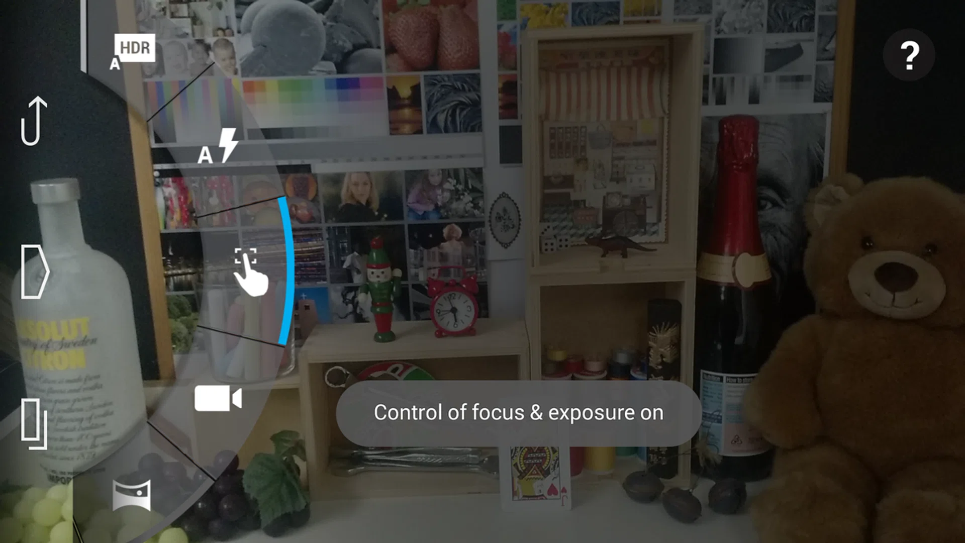 Swipe in from the left to access the menu wheel where you'll find options for HDR, flash, and focus control among others.