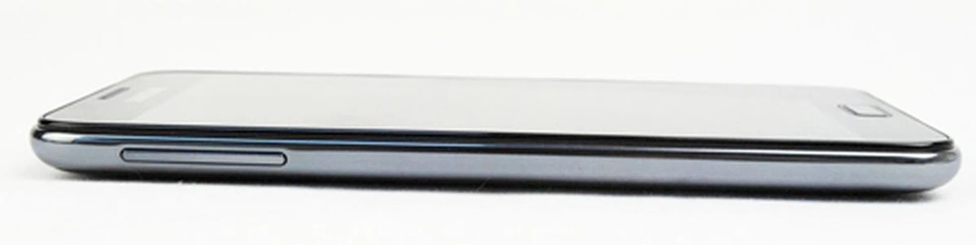 The volume control button resides on the left side of the Samsung Galaxy Note. Thankfully, it is slightly raised for an easier feel. Notice the metal frame running along the sides of the phone. 