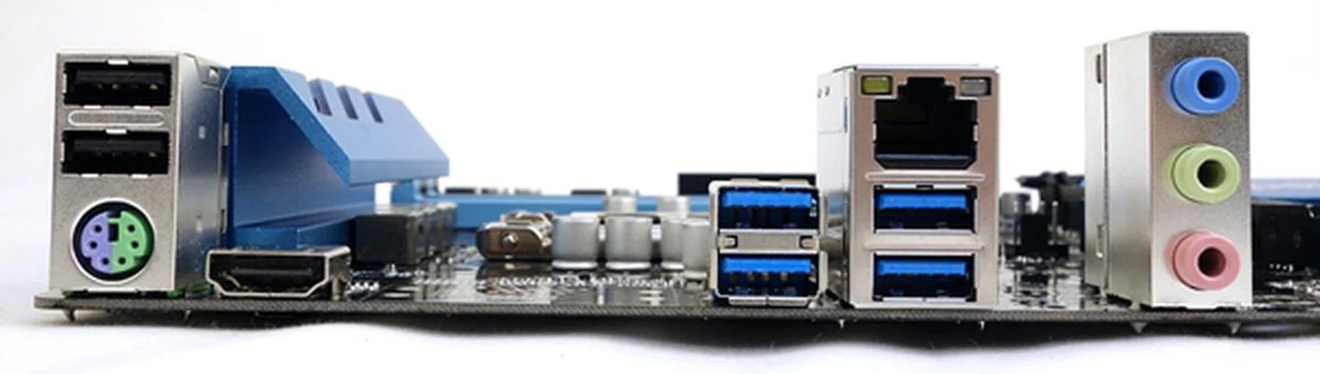 The rear I/O ports consist of a pair of USB 2.0 ports that sit above a PS/2 keyboard and mouse combo port. The HDMI port is next to this stack. There are a total of four USB 3.0 ports, a Gigabit LAN port, and a triplet of audio ports.