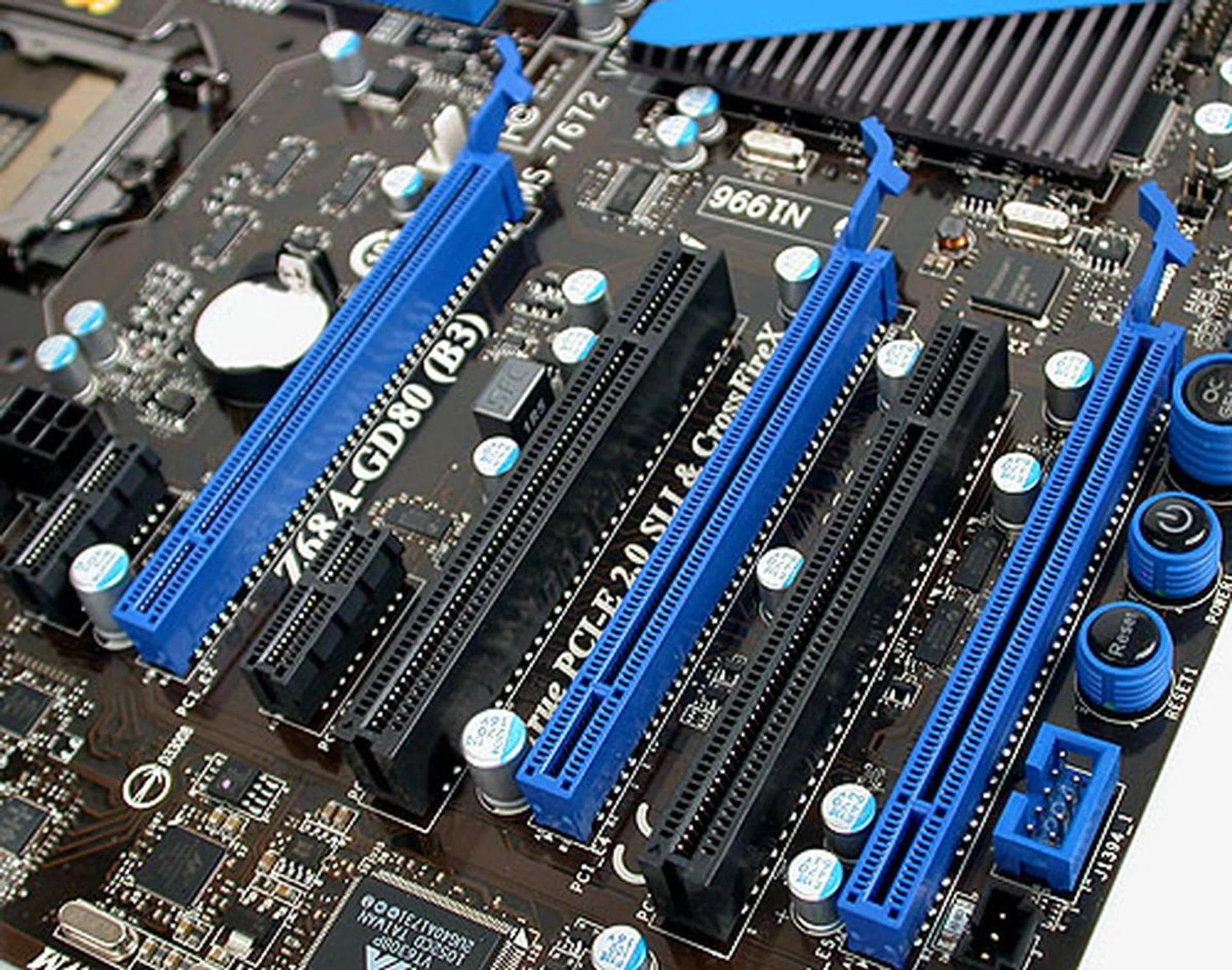 There may be three available PCIe 2.0 x16 slots, but the PCIe configuration defaults to x16/x8/x4 with three cards. And you lose the Marvell and VIA controllers onboard. It's your call if you think that's worth it. 