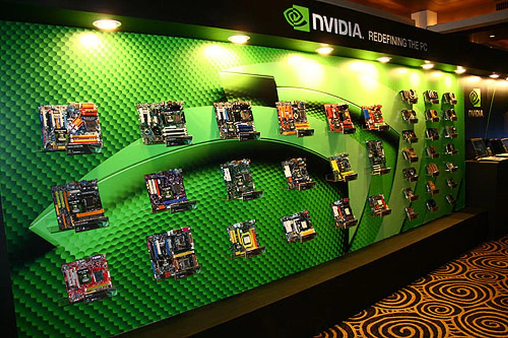  NVIDIA's suite at TWTC Club had a wall full of motherboards and graphics cards based on NVIDIA's latest chips.  