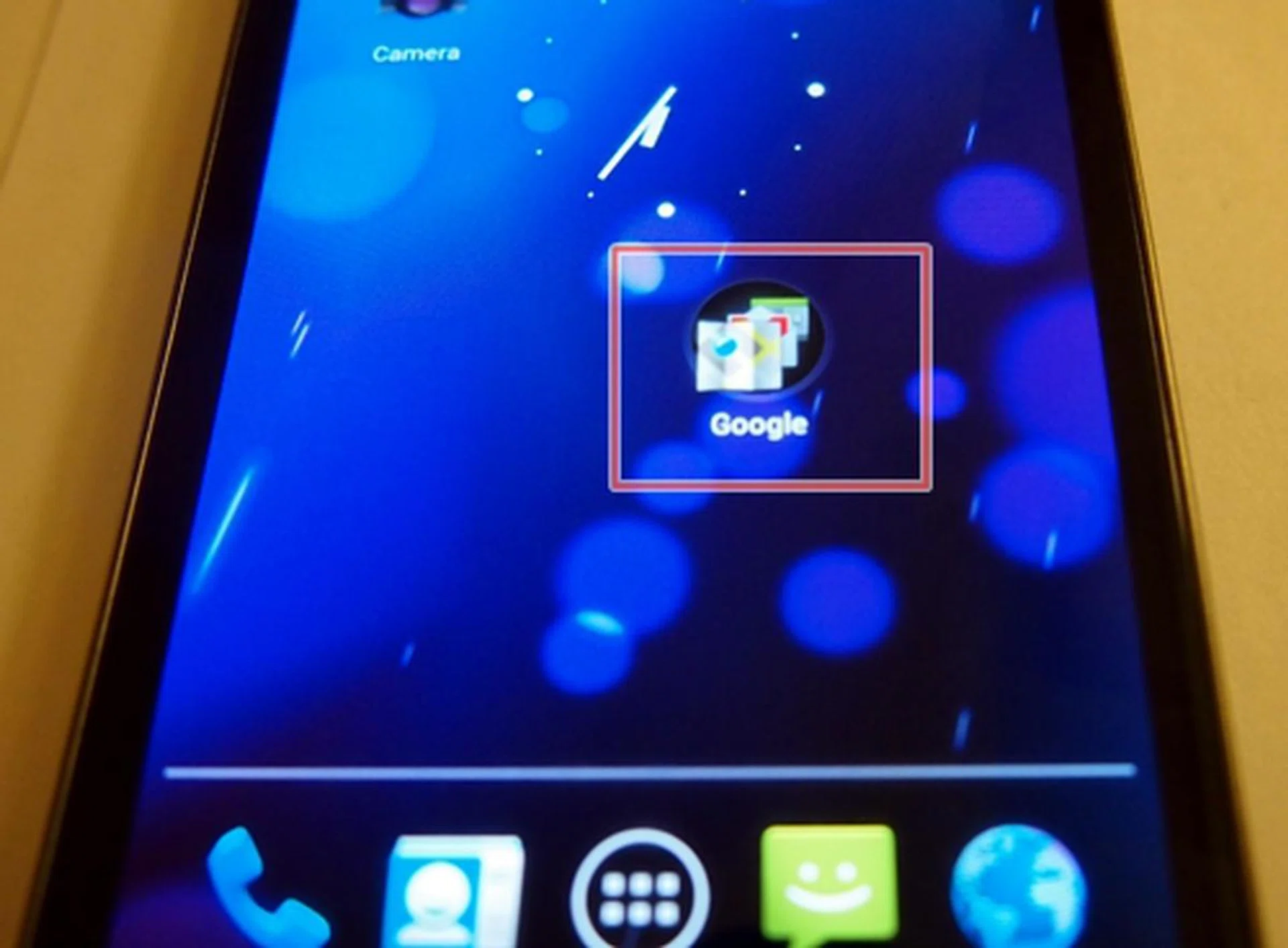 To create a folder on the home screen, simply drag one app onto another to create one.
