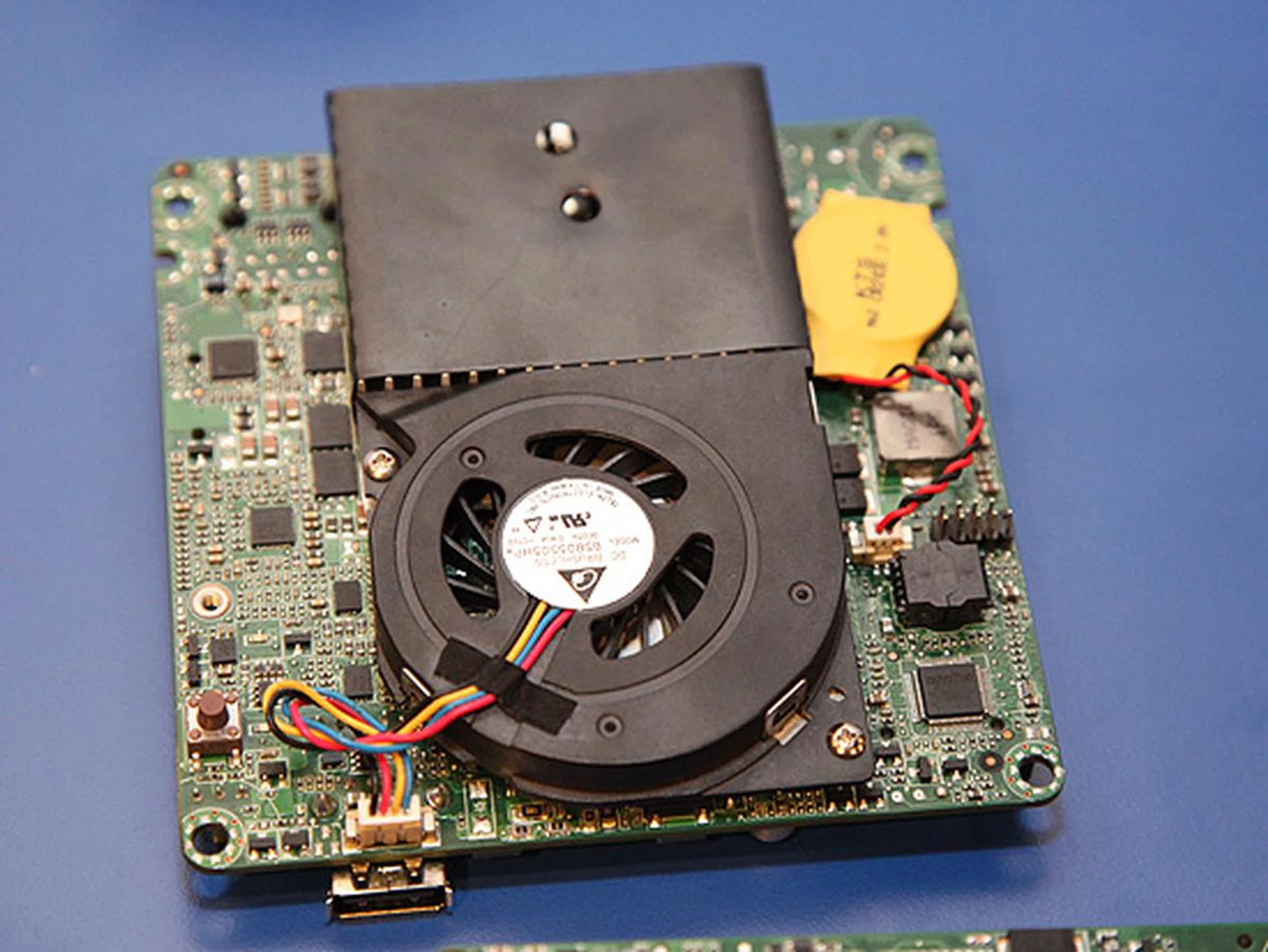 But you'll need a typical slim cooler to keep the system running cool.