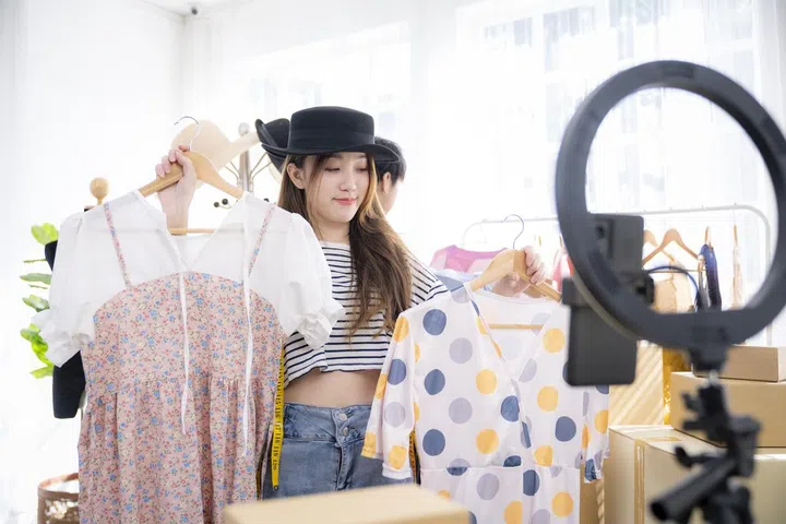 Blogger live streaming, Two young fashion studio owner live and blogging social media.