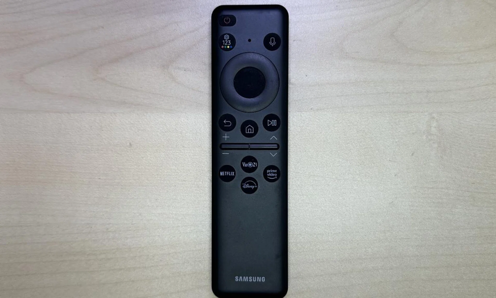 A compact, do-it-all remote. You would be surprised by its functional versatility, given the limited buttons it has.