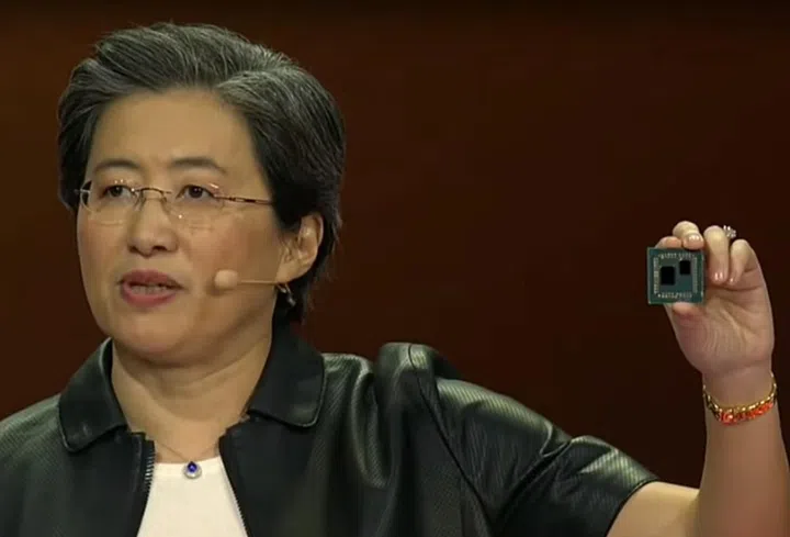 AMD CEO Dr. Lisa Su held up a 3rd-gen AMD Ryzen desktop CPU at CES 2019. (Image source: AMD)