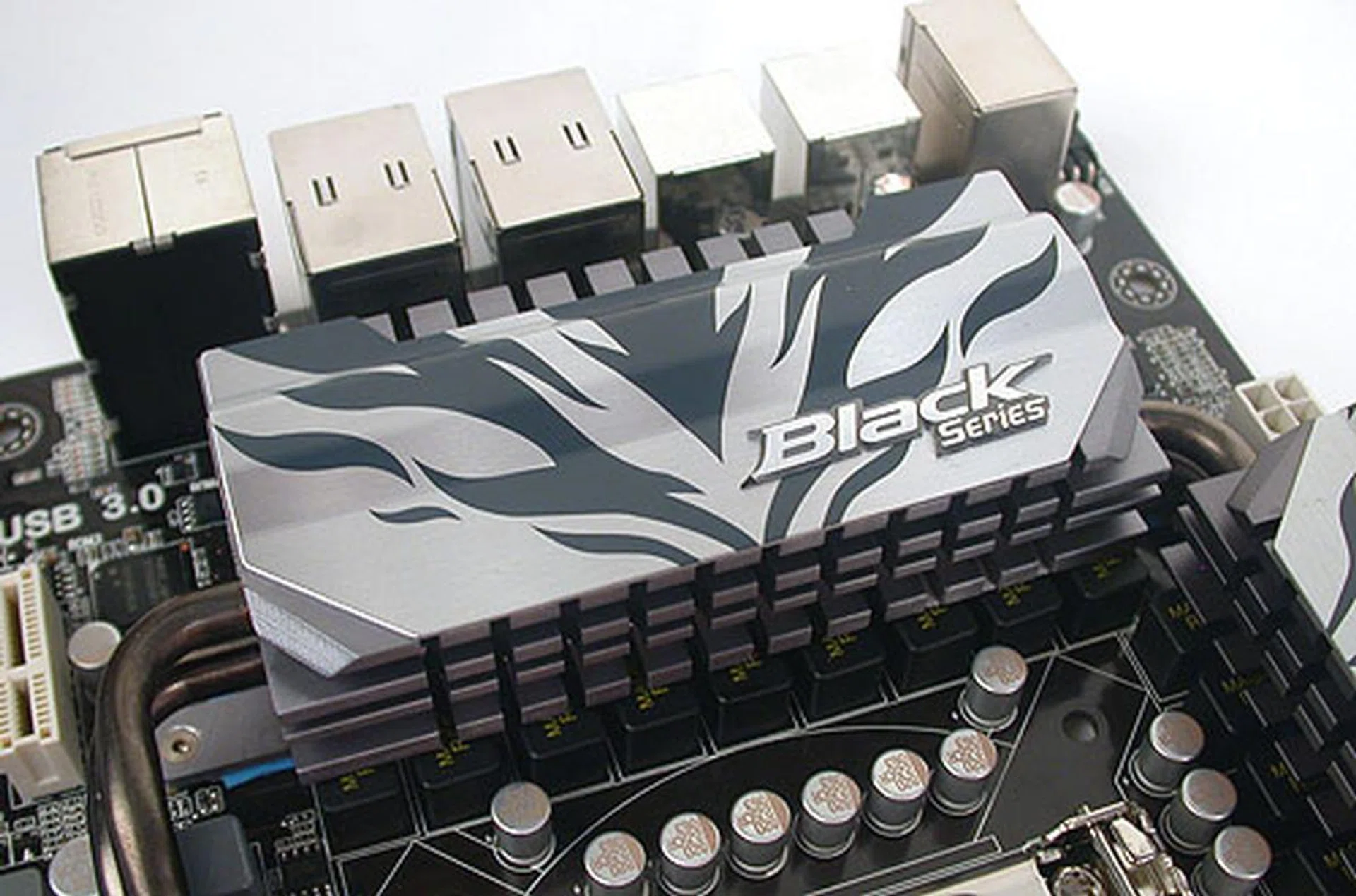 The cooling system consists of dual heat pipes stretching across three heatsinks surrounding the CPU socket. Notice the quality of the components and chokes used here.