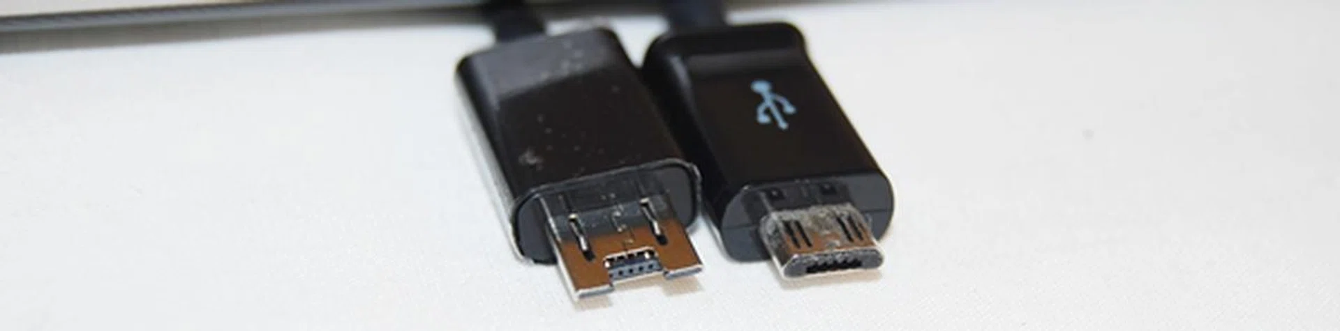 Another point to take note when charging the ASUS PadFone 2 is its unique MHL port. If you forget to bring the 13-pin USB connector (left), you still can charge the PadFone 2 with any normal micro-USB cable (right) but it can be a little loose.