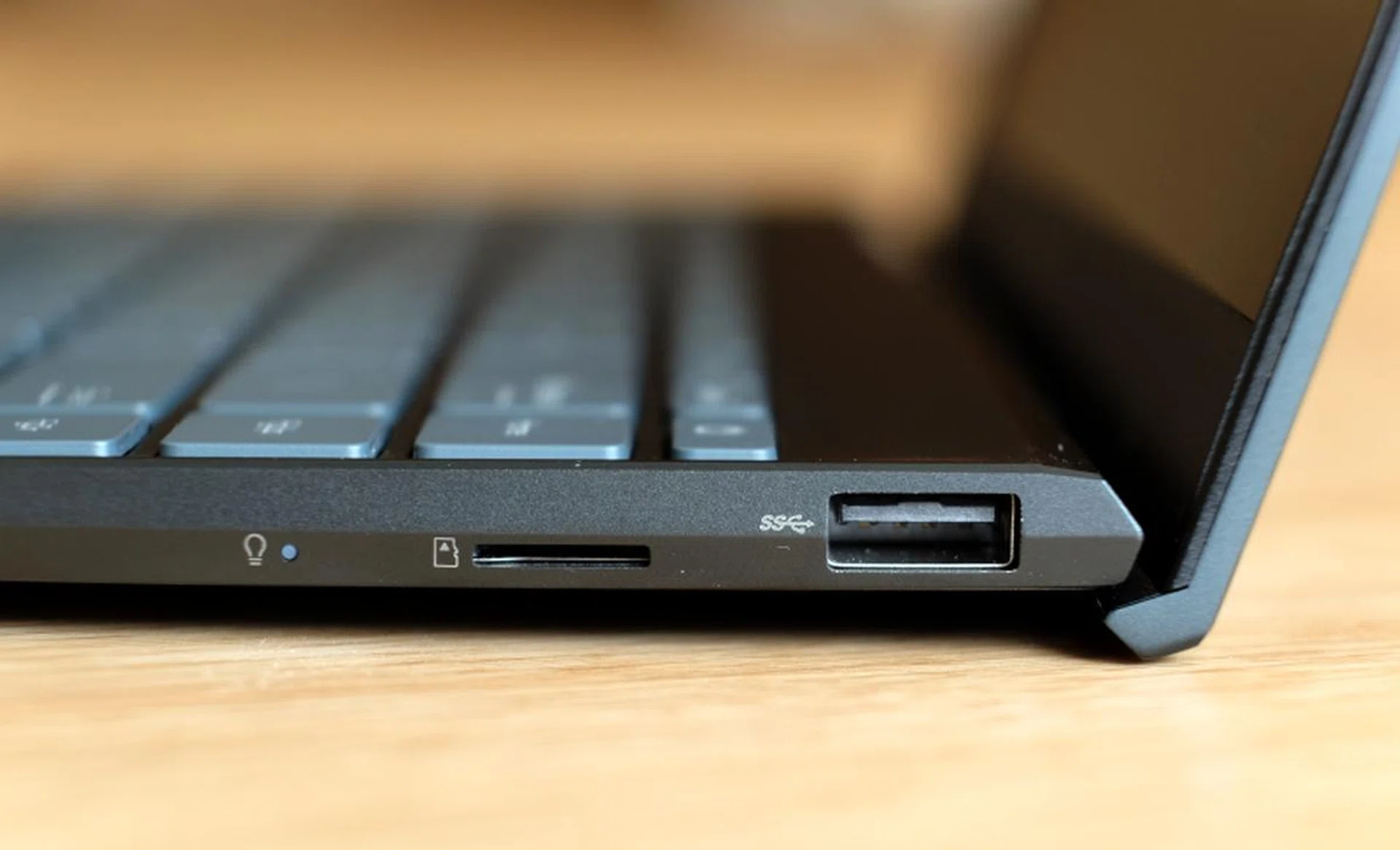 When the notebook is opened, the hinge lifts it up and slightly improves the typing position.