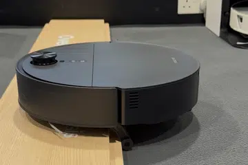 This Roborock robot vacuum has legs!