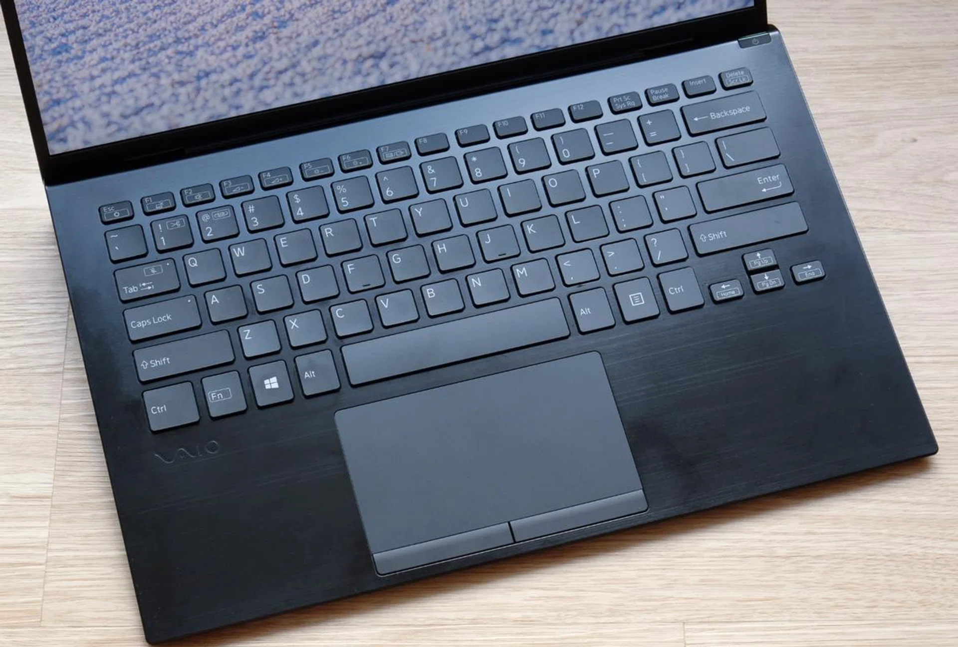 The trackpad is decent but it's non-clickable. The keyboard, fortunately, is quite good with large slightly scalloped keys.