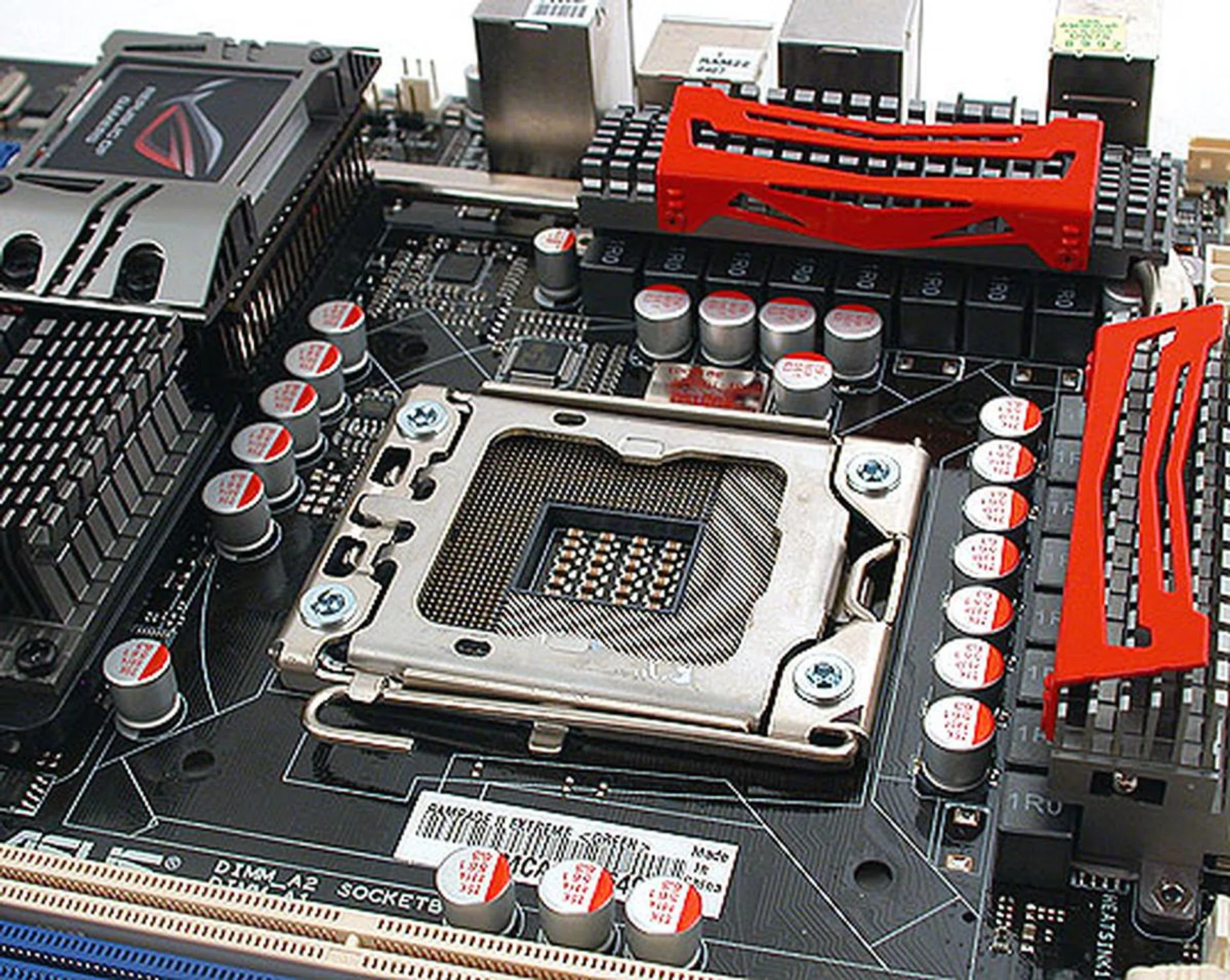 Although the heatsinks near the CPU socket are not overly intrusive, we would have appreciated having more space. Nevertheless, we had no trouble mounting our huge Thermalright Ultra 120 Extreme cooler. This board comes with 16-phase power and solid Japanese-made conductive polymer capacitors. 