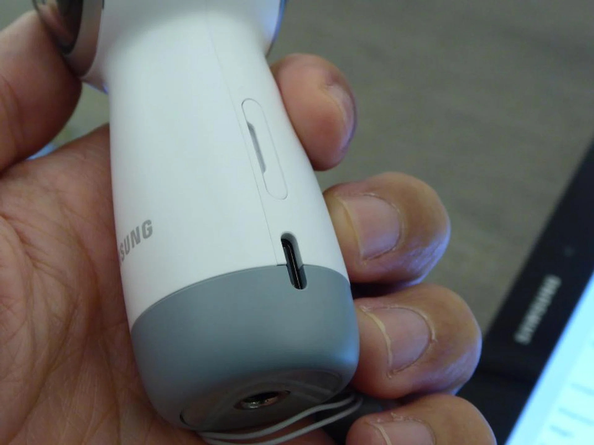 On one side of the handle, you’ll find the microSD slot as well as a USB-C charging port. You'll notice at the bottom, it also retains a tripod mount.