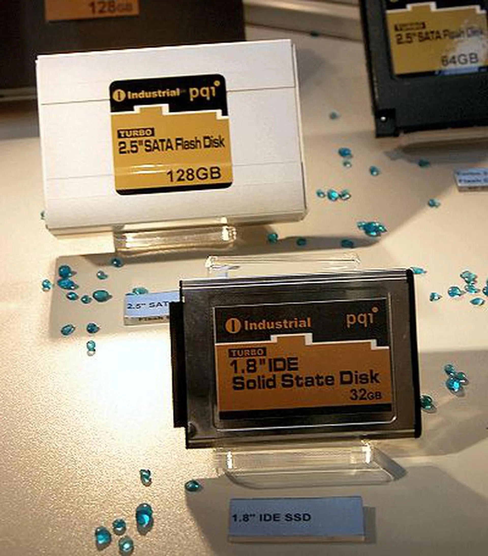  However in a few months, PQI will have a 2.5-inch flash hard drive with a 128GB capacity. At the moment, it's in its early stage and as seen in the picture, it is physically larger than a standard 2.5-inch drive. If they can churn this fast enough, they could be the first to achieve this capacity.  