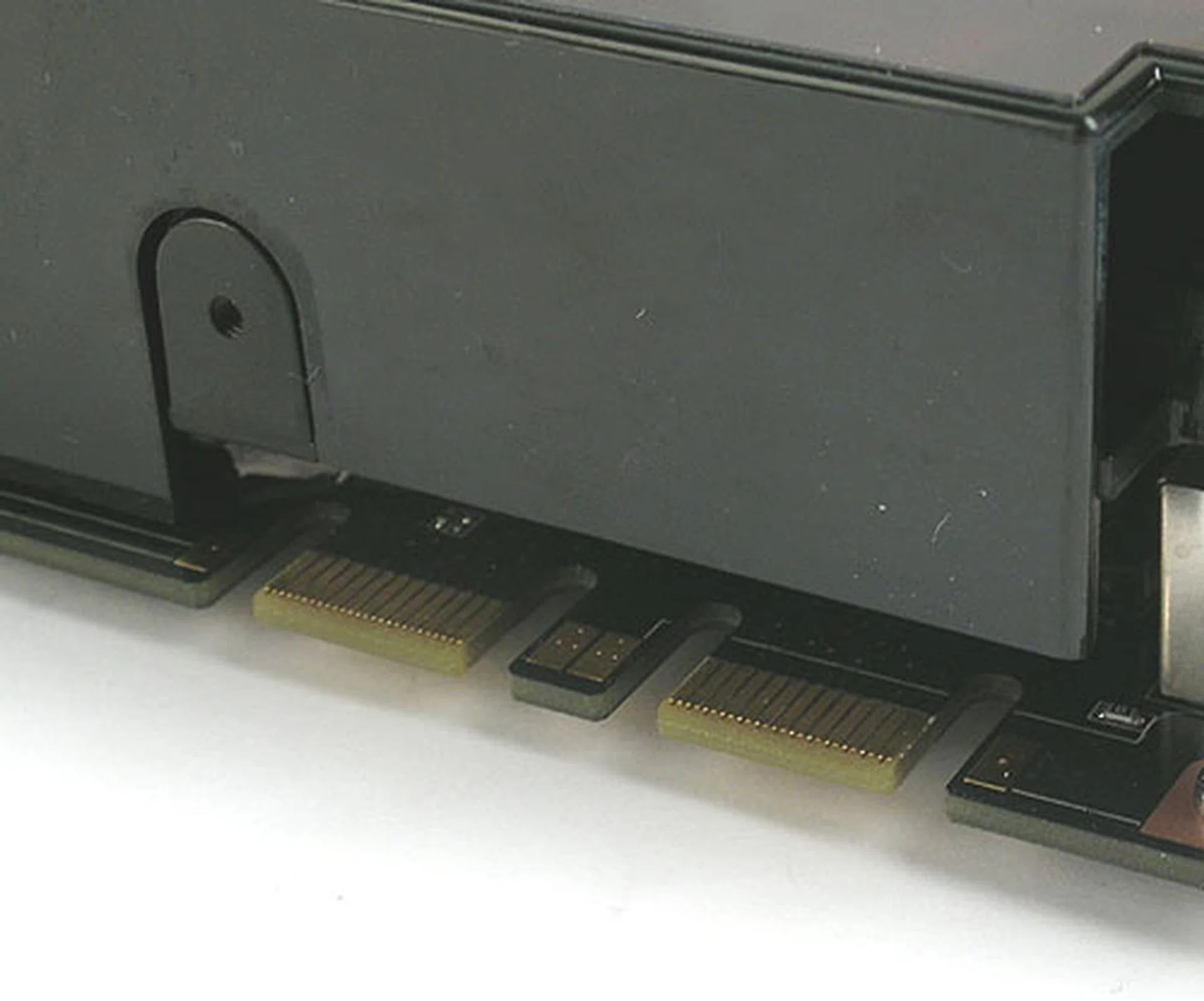 Living up to its 'GTX' pedigree, the GeForce 9800 GTX is capable of 3-way SLI as these two SLI connectors suggest.
