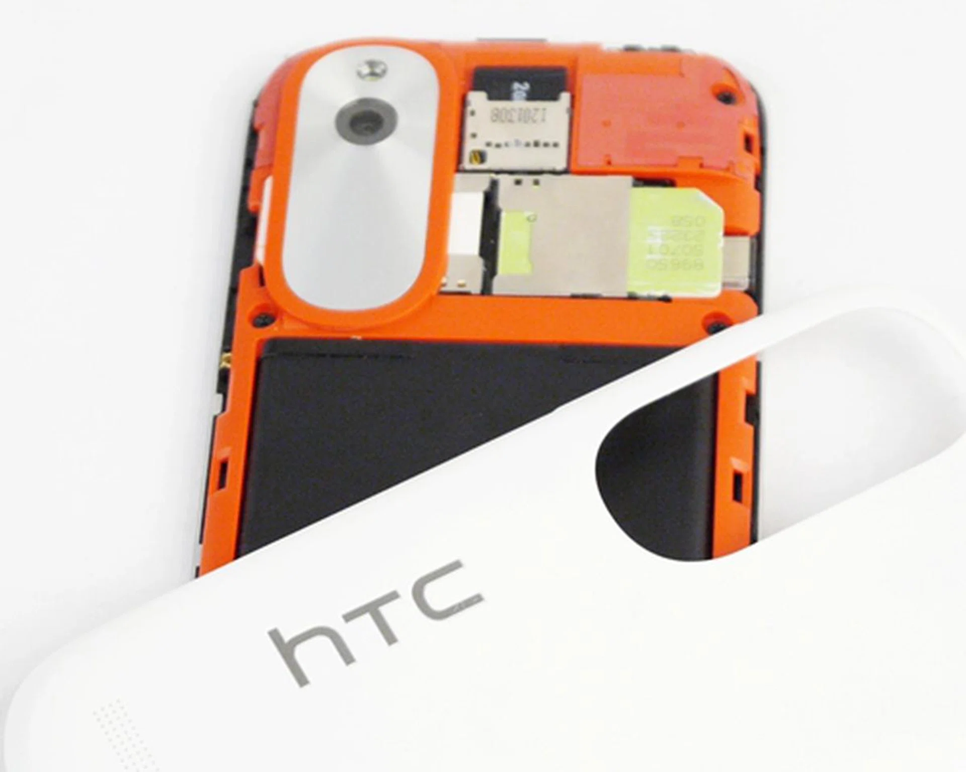 The SIM card slots are placed side-by-side. The microSD card compartment is situated above them. All of these are however not accessible until unless the back cover is pried open, which is reasonable for 'non-premium' phones.