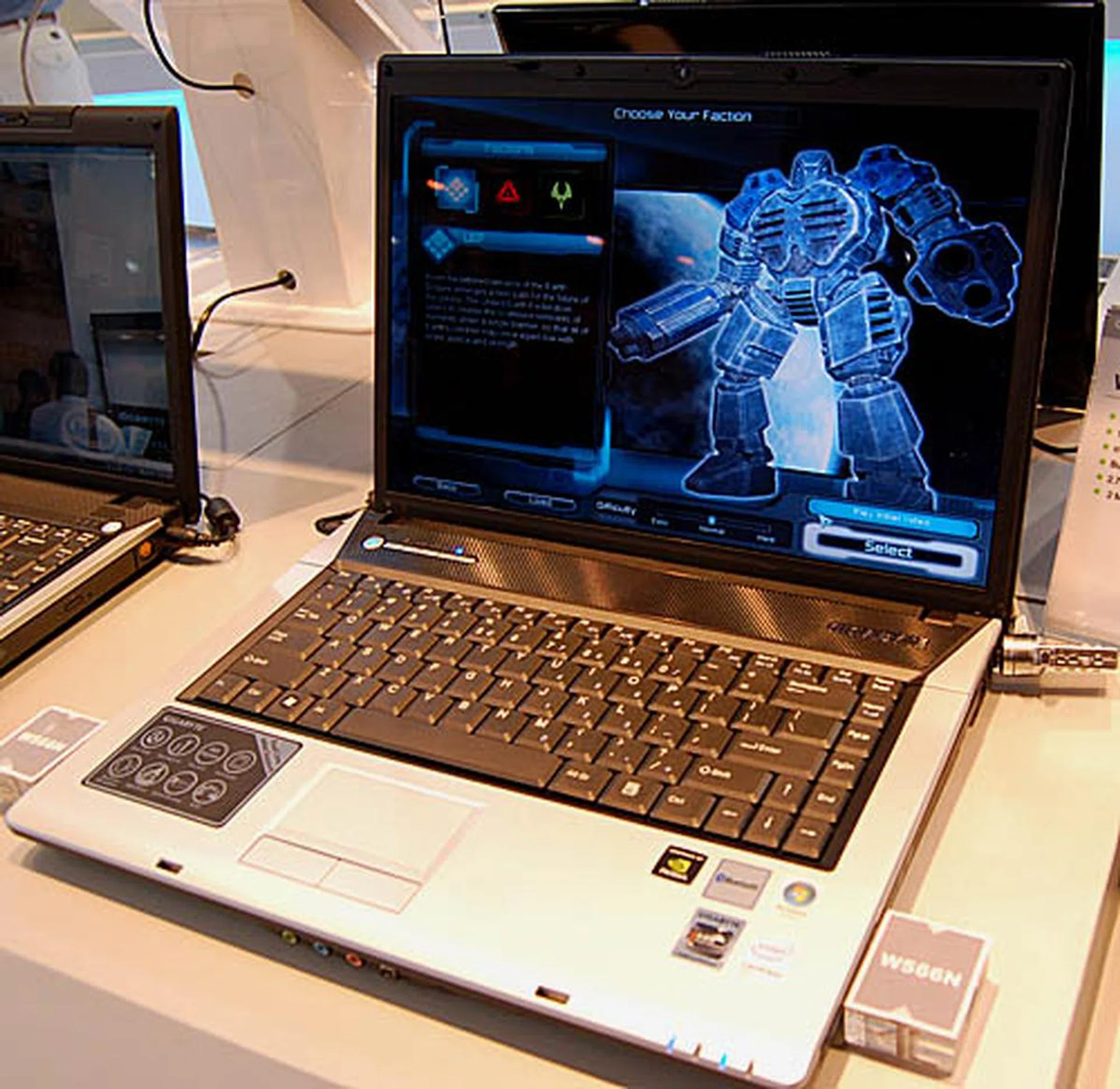  Gigabyte also has a couple of the newer notebooks on display, like this Santa Rosa based W566N. It comes preloaded with Windows Vista and the 15.4-inch is complemented by GeForce 8 Mobility graphics. In total, it will weigh around 2,7kg.  
