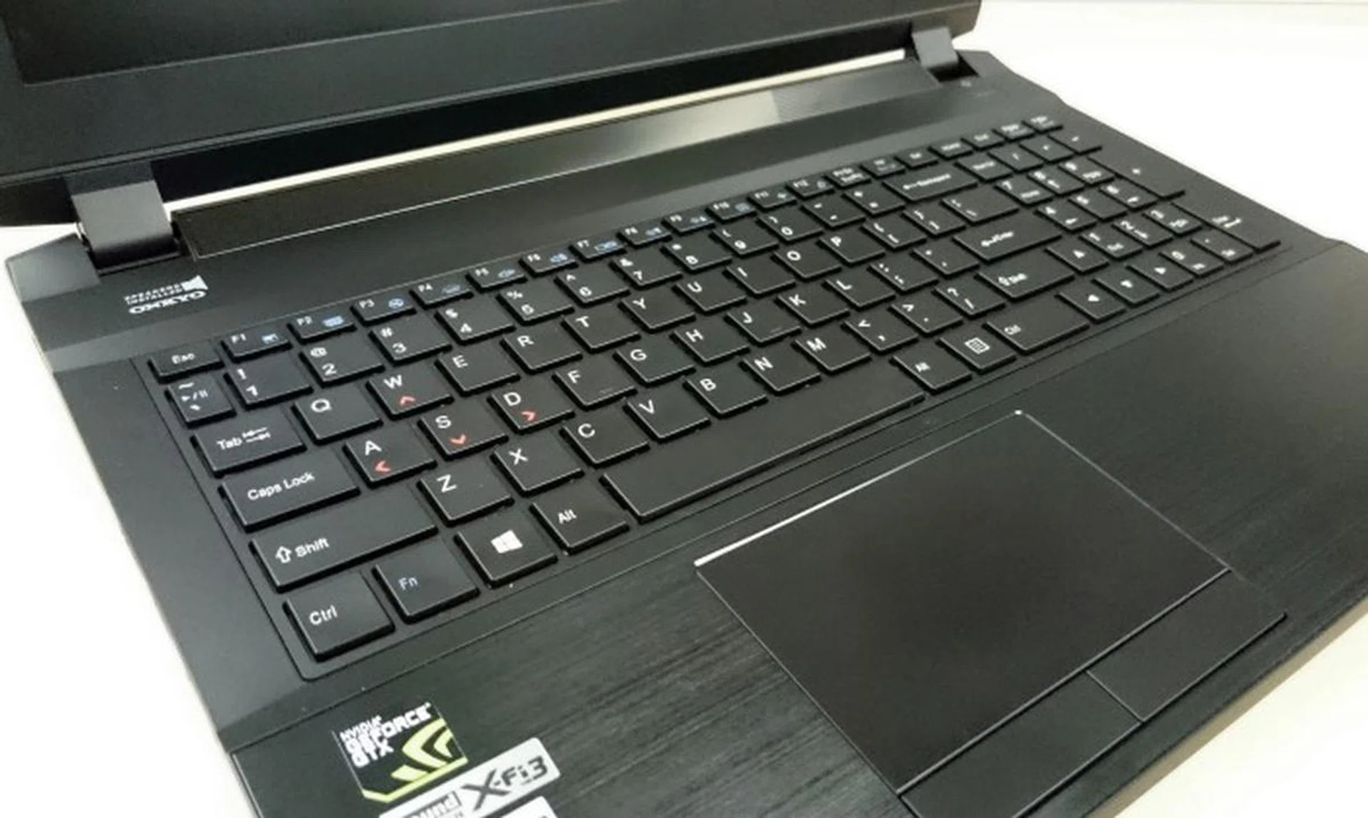 A close look at the decently spaced out keyboard. Note that a number pad is available and all the keys are programmable, including setting up macros. The keyboard well is one of the few locations where metal alloy isn’t used. Plastic is used instead as Aftershock believes the user shouldn’t have to feel the heat while using the keyboard (metal is of course a good conductor of heat).
