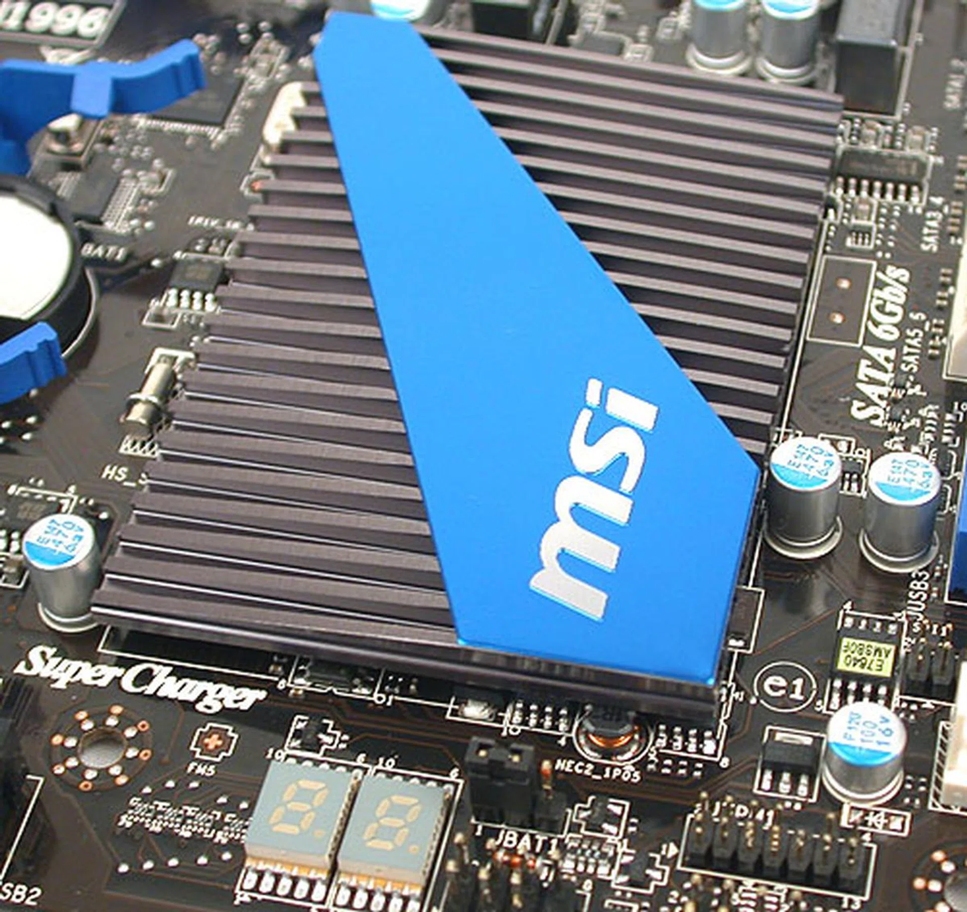 This rather flat heatsink for the Southbridge is one that we have seen on other MSI boards. There's also a debug LED with the codes listed in the manual. 