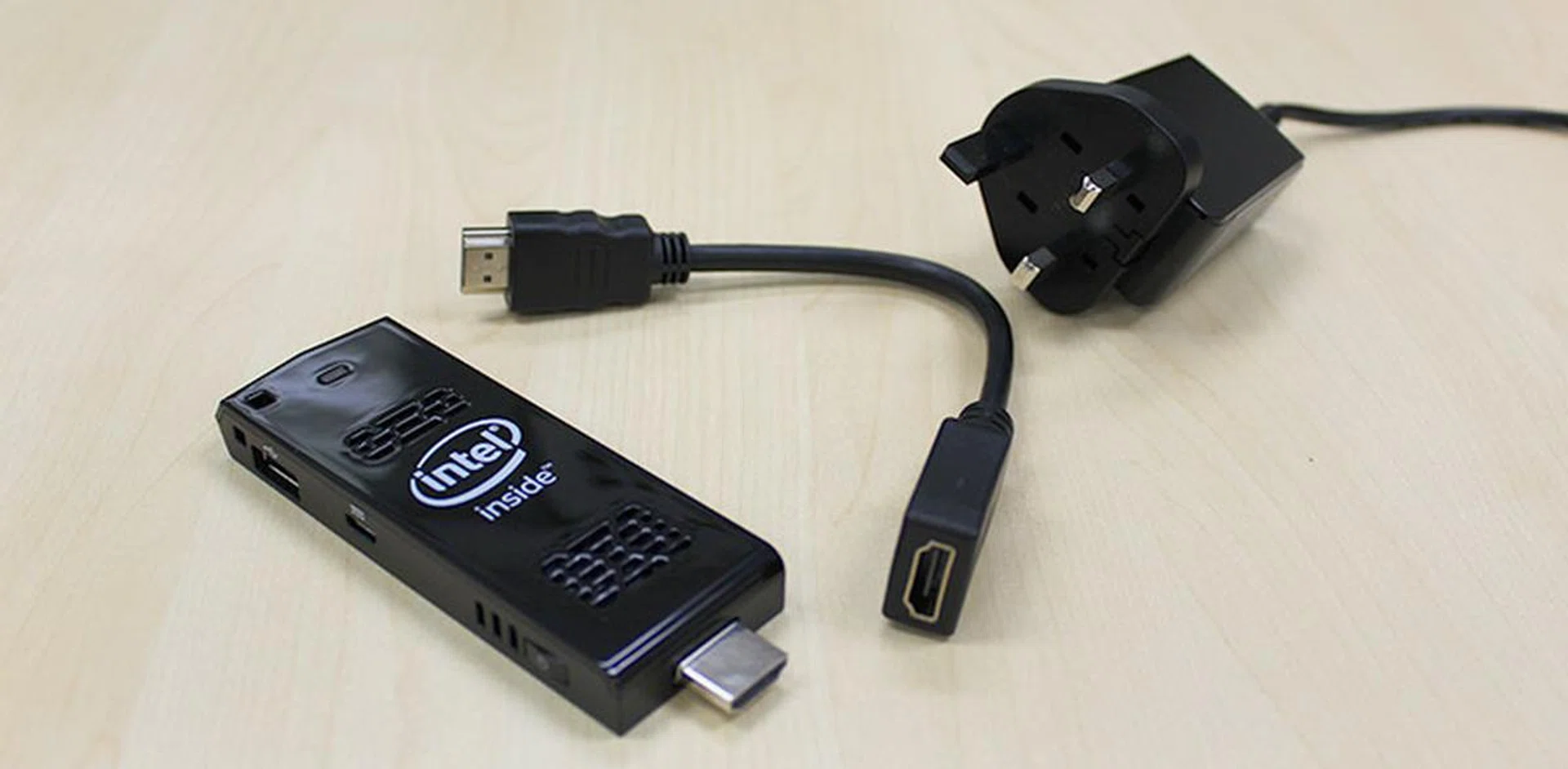 You'll need to pack the included power adapter along with the Compute Stick. There's also an HDMI extension cable bundled.