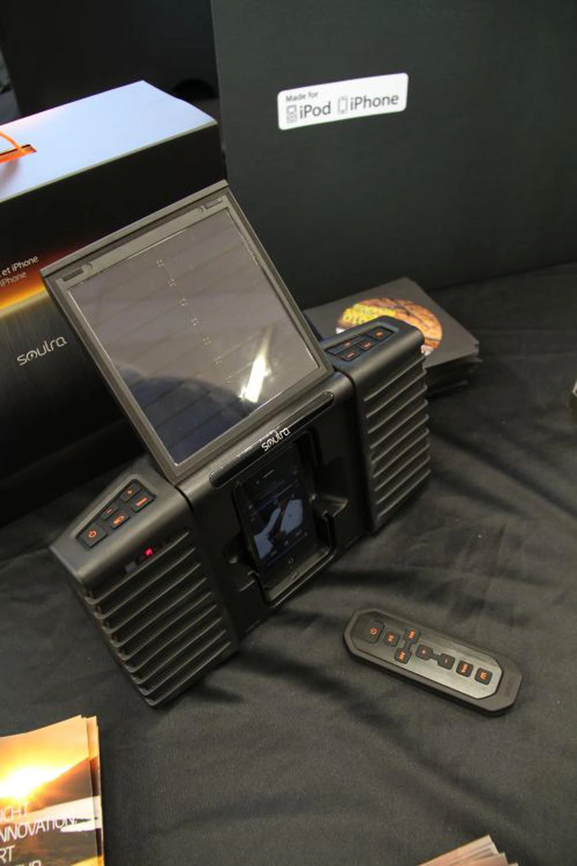 Soulra is a solar powered sound system for iPod and iPhone. It is equipped with a built-in rechargeable lithium ion battery pack and the unit is made in a rugged/rubberized case and aluminum body. It is also splash-proof with its IPX-4 case. The Soulra can last 4 hours with a full charge, and another 4 hours of playback with the solar panel lid opened towards sunlight.