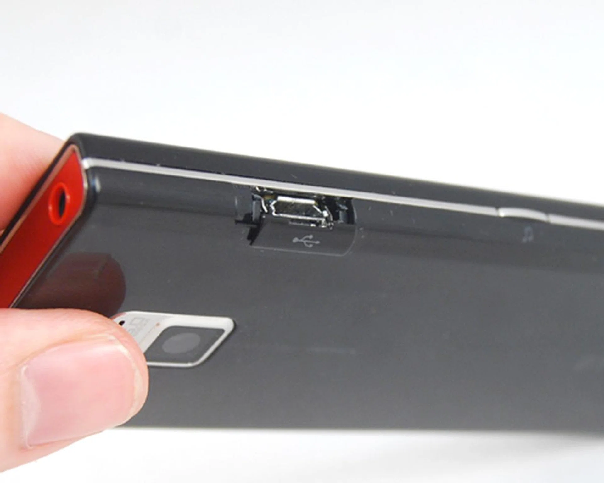 We've always loved how devices such as the Chocolate does away with dangling covers and integrates with a slider cover instead.