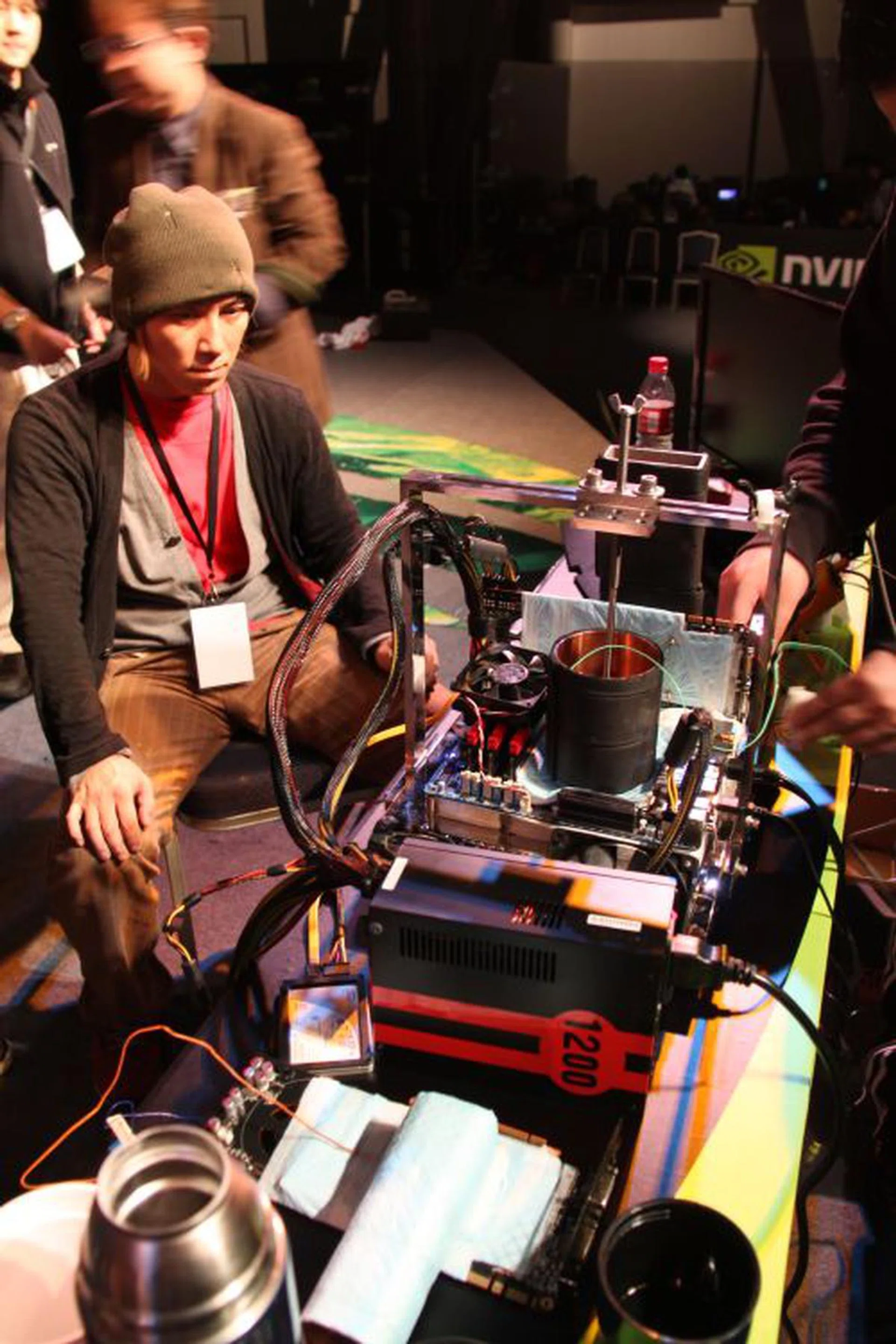 One of the highlights of the festival was when Japanese overclocker, nicknamed "Duck" (wearing a beanie), came on stage to overclock the NVIDIA GeForce GTX4 80 GPU beyond its 700MHz default clock speed. 