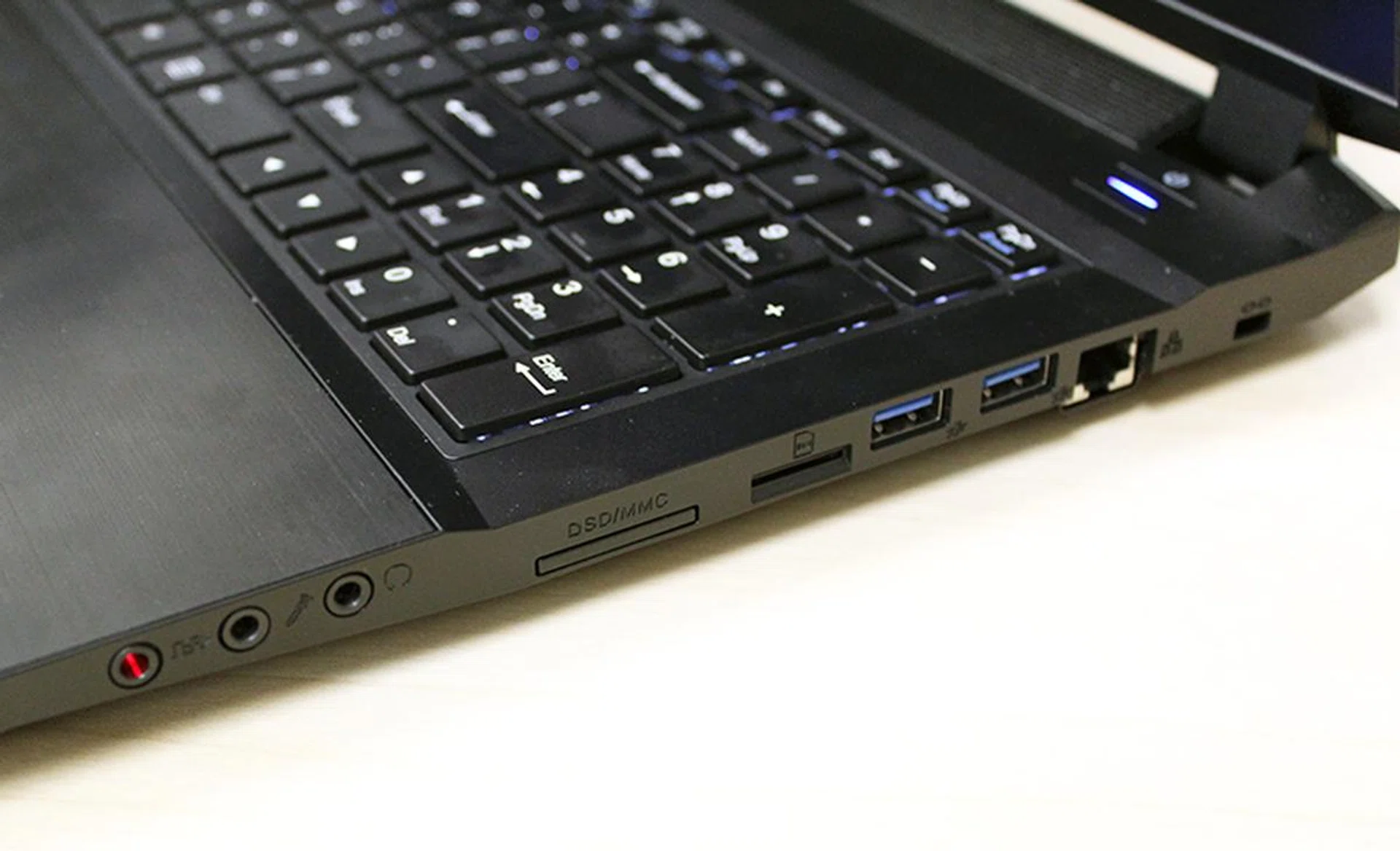 On the right are the various audio jacks, SD card reader, two USB 3.0 ports and an Ethernet LAN jack.