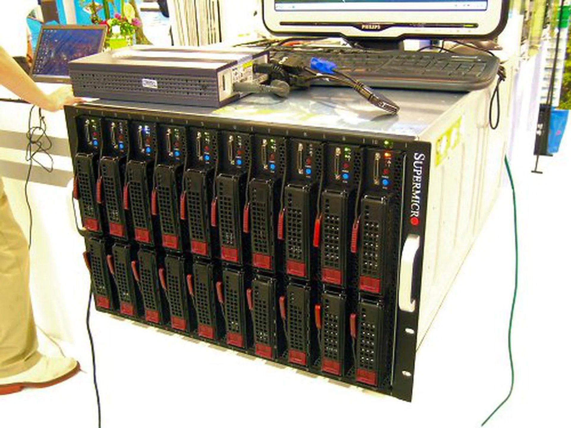  Supermicro is touting their newest SuperBlade server platforms that can be configured for both Intel Xeon and AMD Opteron processors. The SuperBlade offers the best density in the industry for 7U chassis, highest power efficiency (up to 90+%), the fastest InifiniBand network and is more cost effective than 1U servers.  
