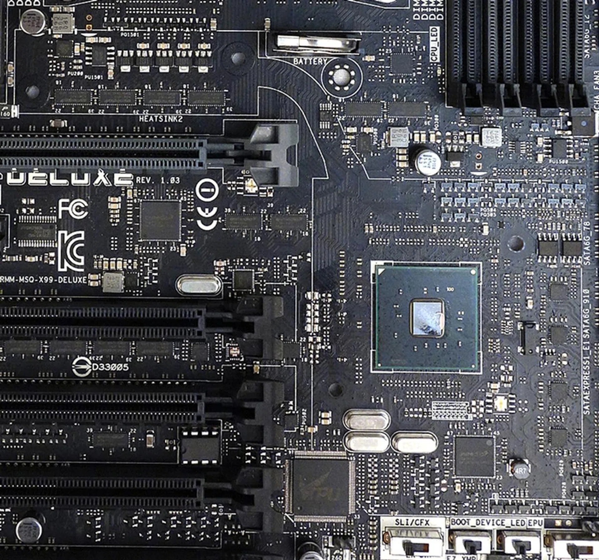 The other half of the heatsink, which is connected to the PCH heatsink, conceals a collection of ASMedia ASM1480 switches.